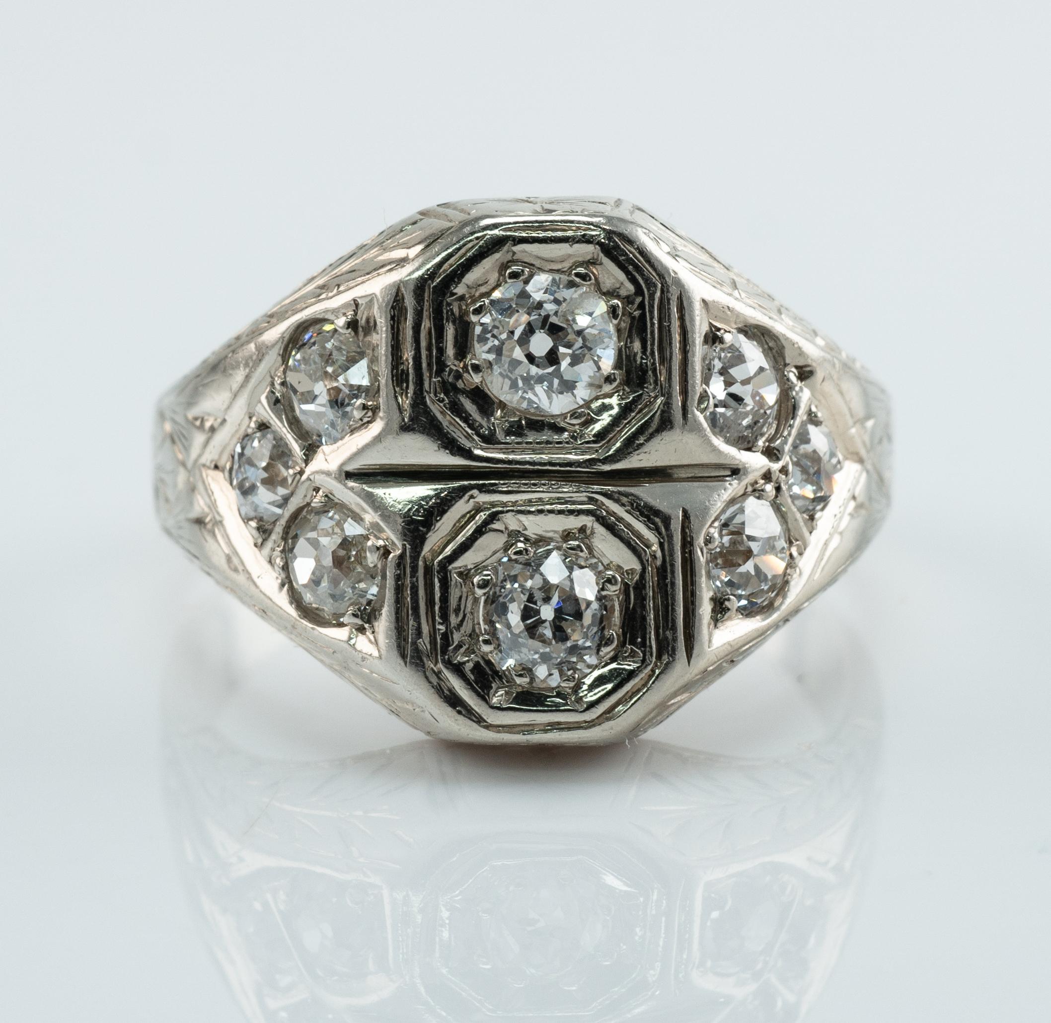 This vintage circa 1930s ring is crafted in solid 14K White Gold (carefully tested and guaranteed). 
Two center old mine cut diamonds are .20ct and .18ct.
Six side diamonds are 0.08ct (4 gems) and 0.06ct (2 gems) = .44 carats.
The total diamond