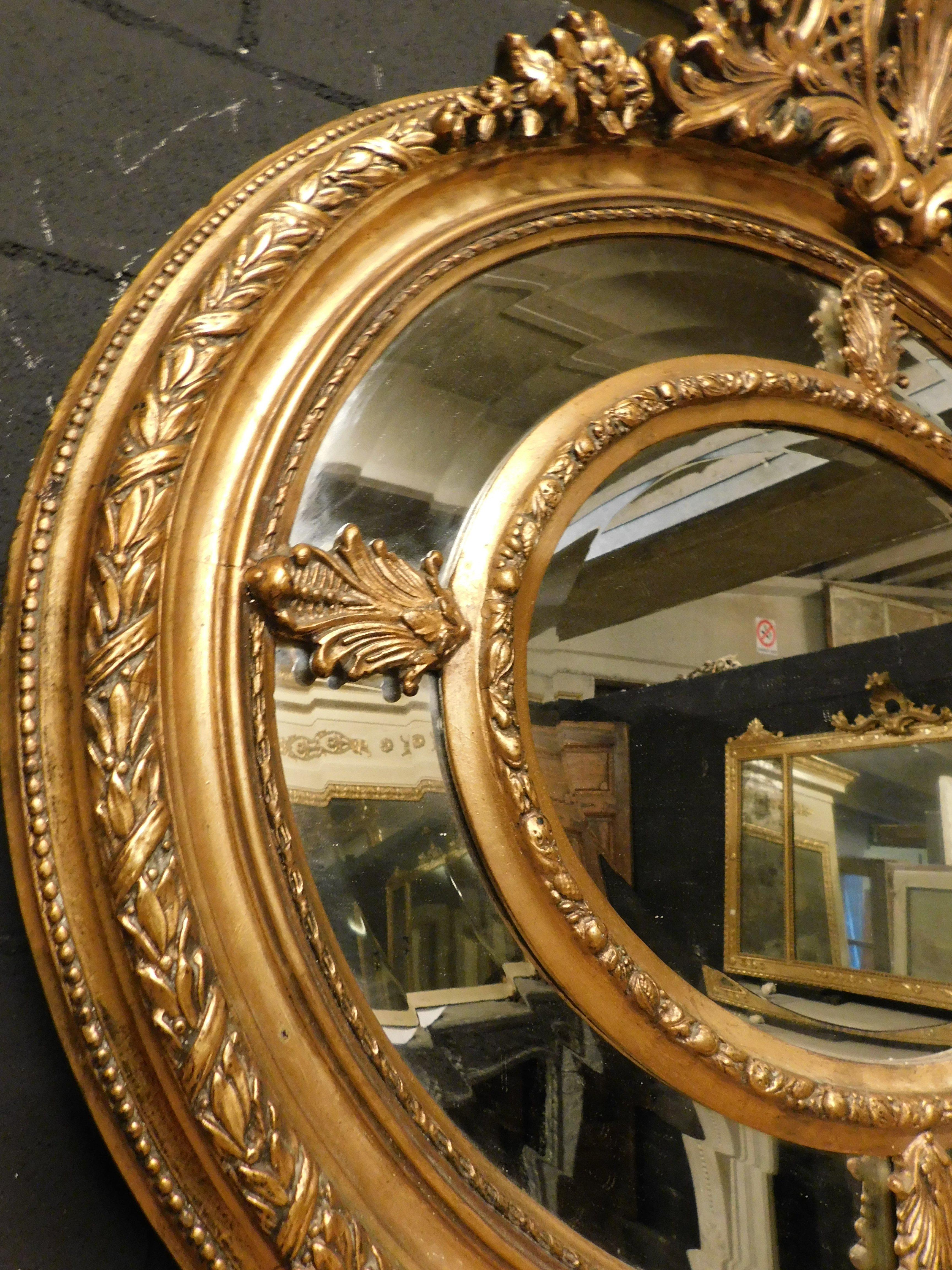 Old mirror in gilded and richly carved wood, France For Sale 1