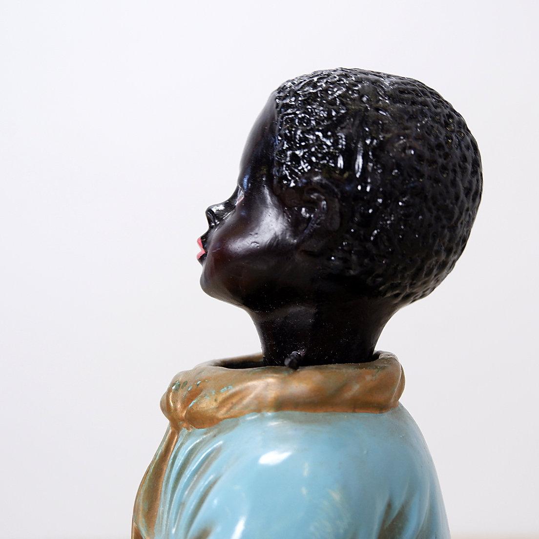 Old mission money box - Circa 1958
Antique - Object of curiosity
Vintage plaster Mission piggy bank. When a coin is thrown into the slot, the man nods his head in gratitude
Measures : 18x11,5cm H:33cm 
Materiel : Plaster 
Wear consistent with age
