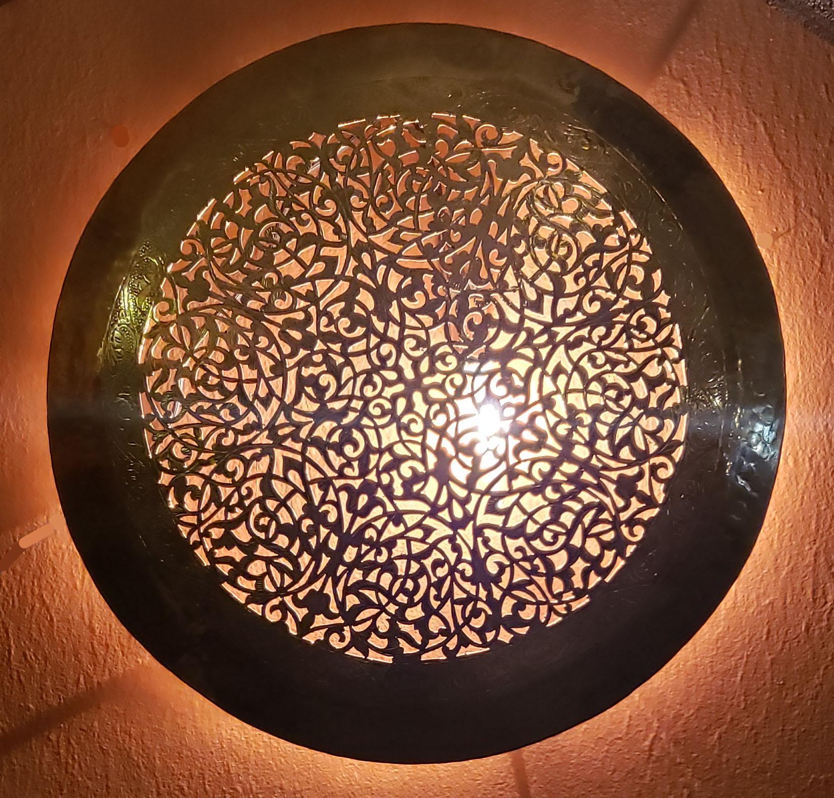 Made from pure copper, this is one of the most amazing and beautiful Moroccan wall sconces we have ever carried in stock. Show-stopper anywhere in your home / garden / spa / restaurant. Each is handmade using ancient artisan methods which consist of