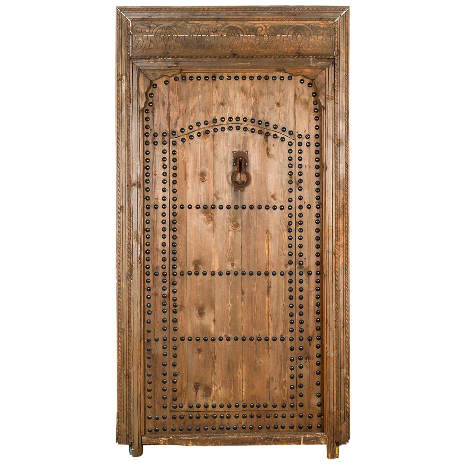 Old Moroccan Door in Frame with Wicket Gate, 20th Century For Sale