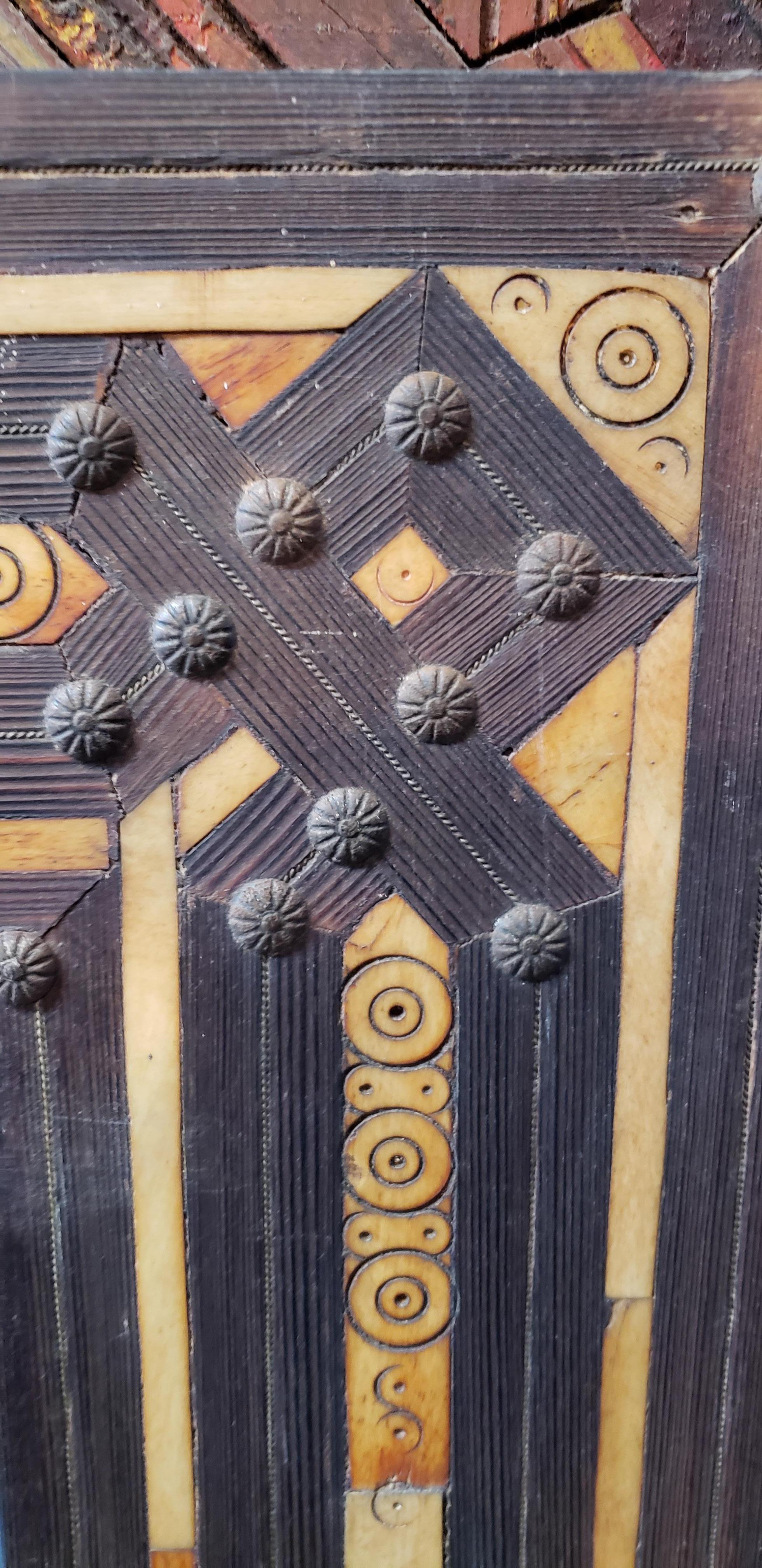 A few decades old.
Large size metal and camel bone inlay Moroccan mirror. Made in the city of Marrakech. Rectangular shape, measuring approximately 55