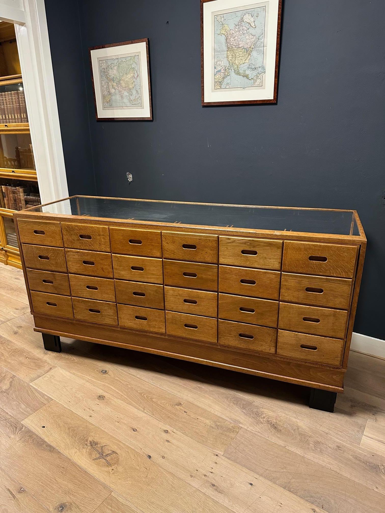 Edwardian Old oak counter/display case with 24 drawers For Sale