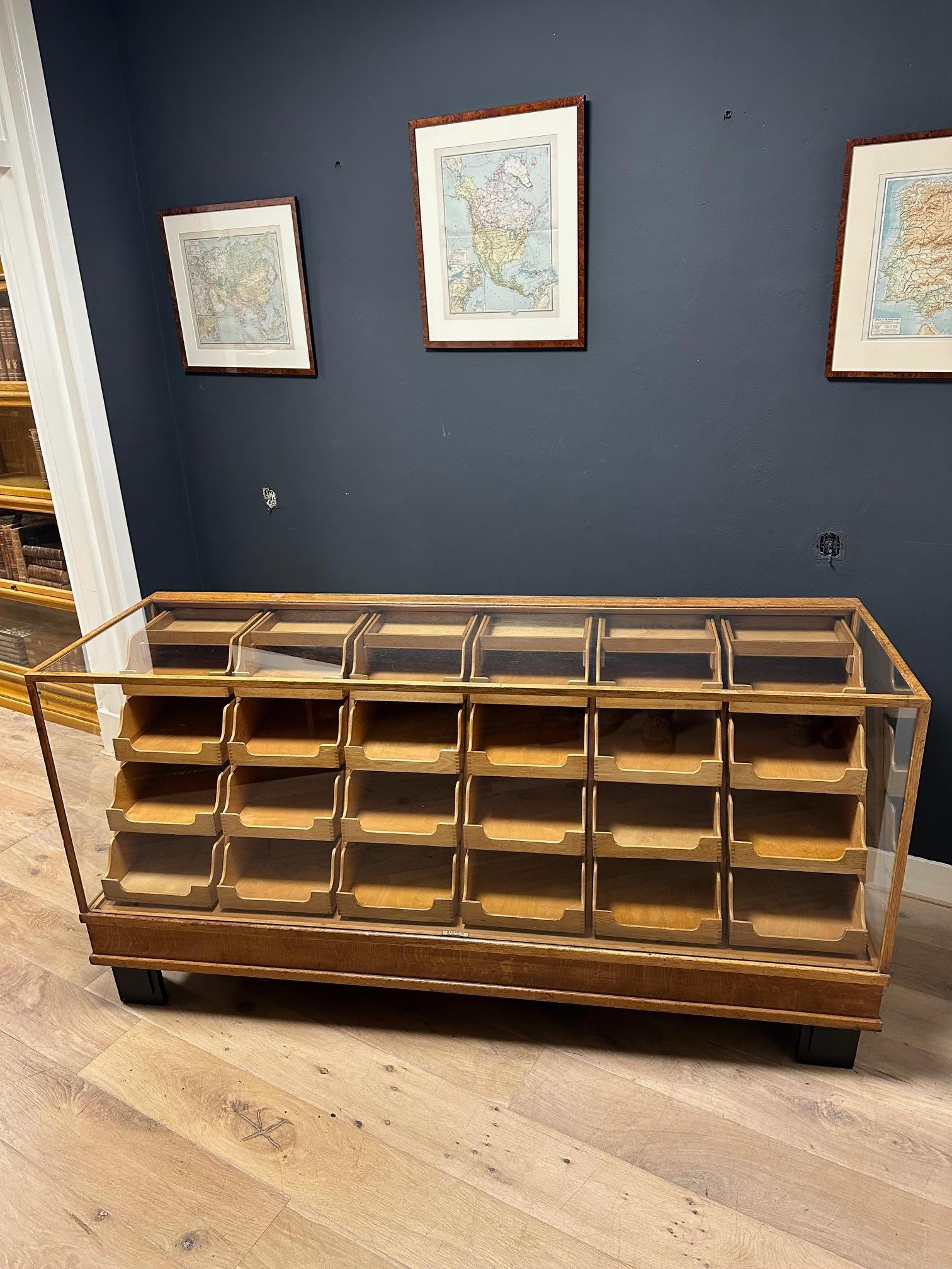 Oak Old oak counter/display case with 24 drawers For Sale