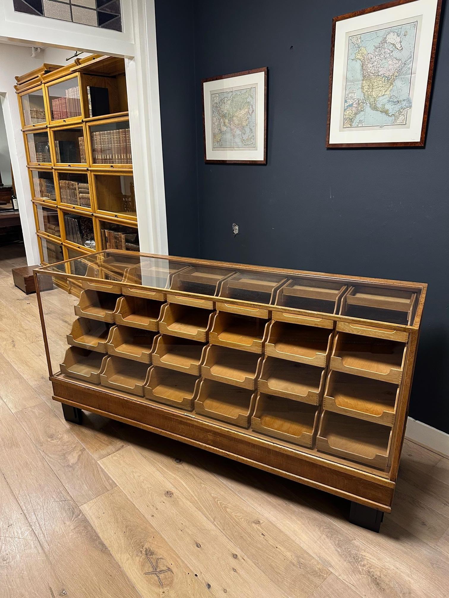 Old oak counter/display case with 24 drawers For Sale 1