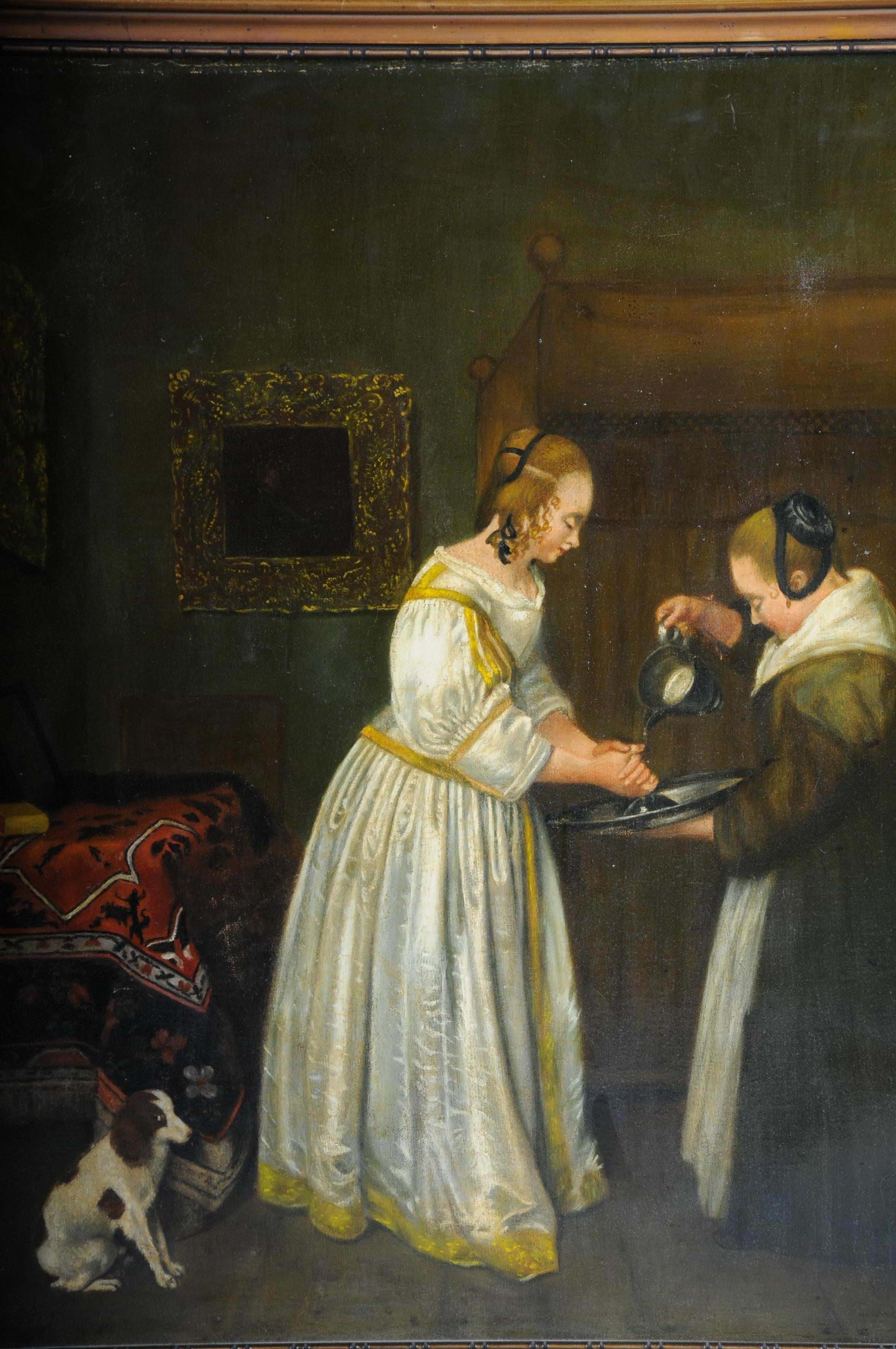 Old oil painting after J. Vermeer manner, old master, circa 1900

Oil on canvas. Hand painted in the manner of J. Vermeer. High quality painter depicting a landlady who has a servant wash her hands. A domestic dog is sitting behind her.