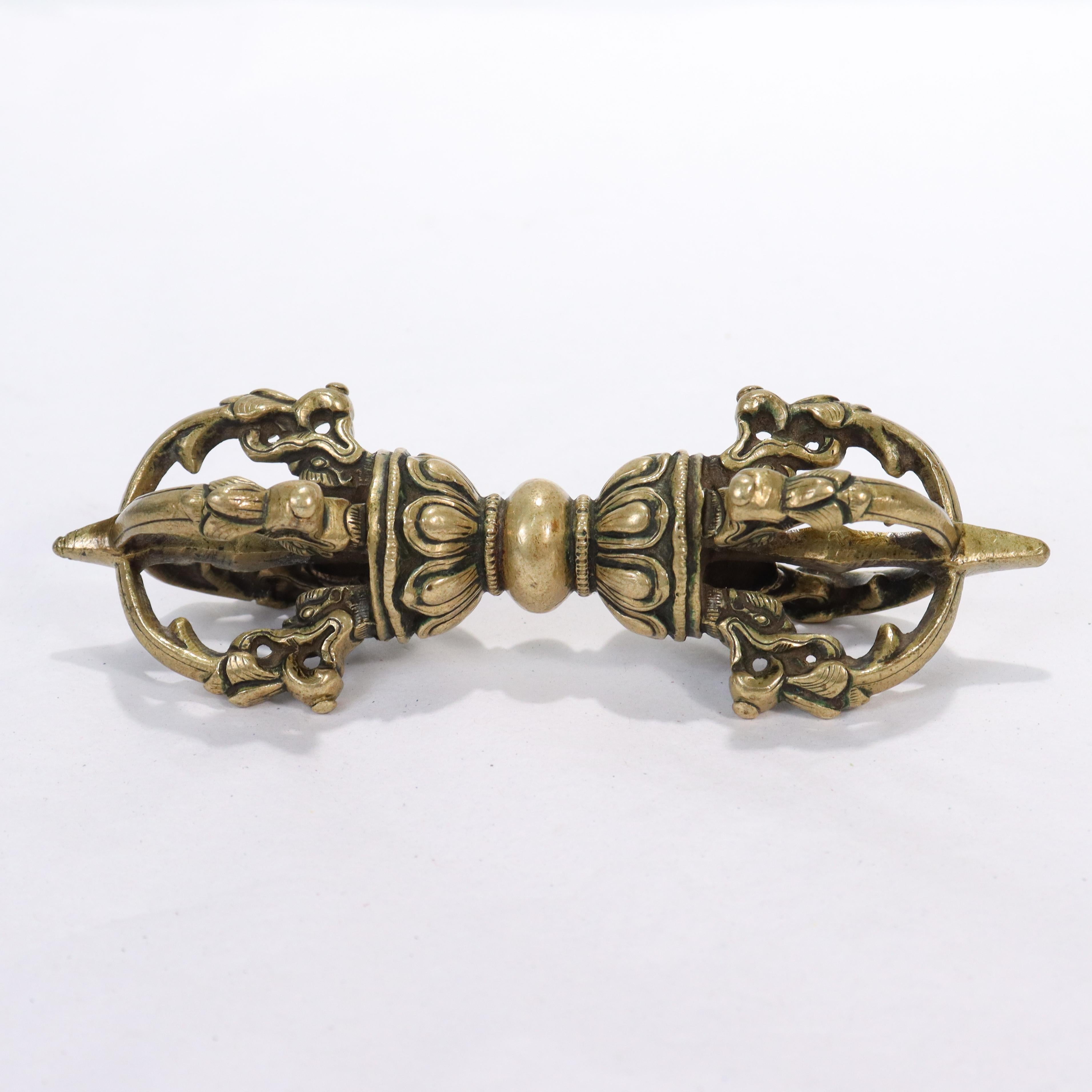 A fine old or antique vajra.

The vajra (or dorje) is a dharmic ritual weapon symbolizing the properties both a thunderbolt (irresistible force) and a diamond (indestructability).

Found in a Pennsylvania estate.

Simply a wonderful
