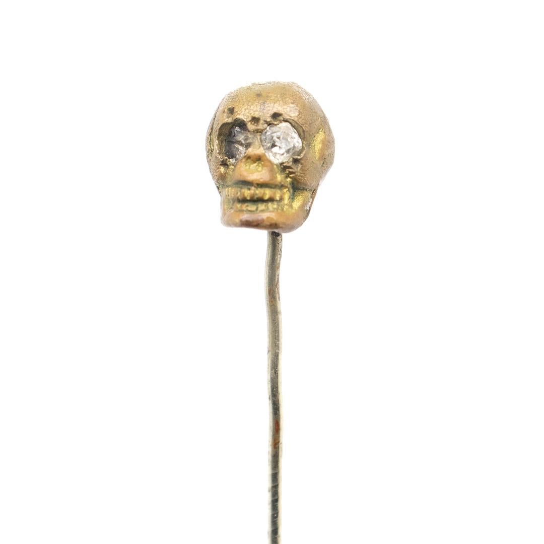 Old or Antique Estate Bronze Skull Memento Mori Stick Pin with Glass Eyes For Sale 1