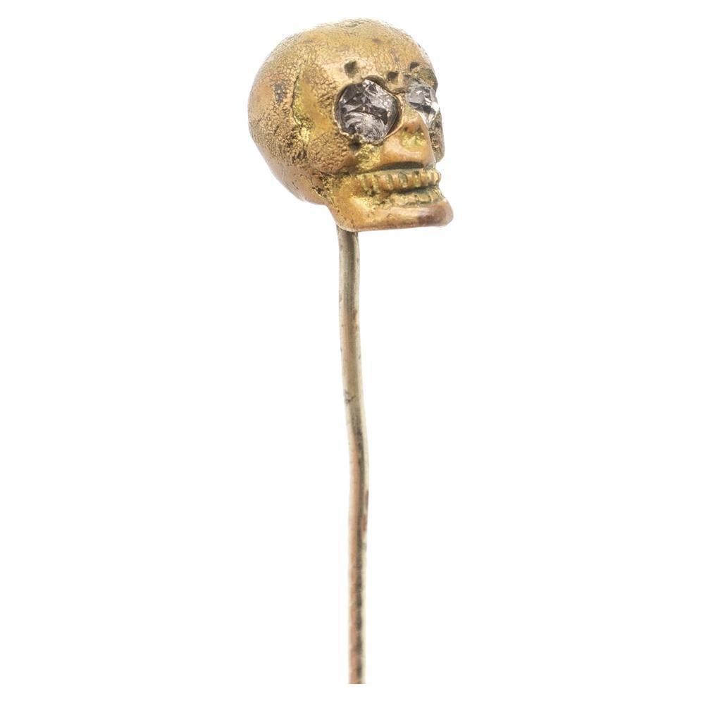 Old or Antique Estate Bronze Skull Memento Mori Stick Pin with Glass Eyes For Sale