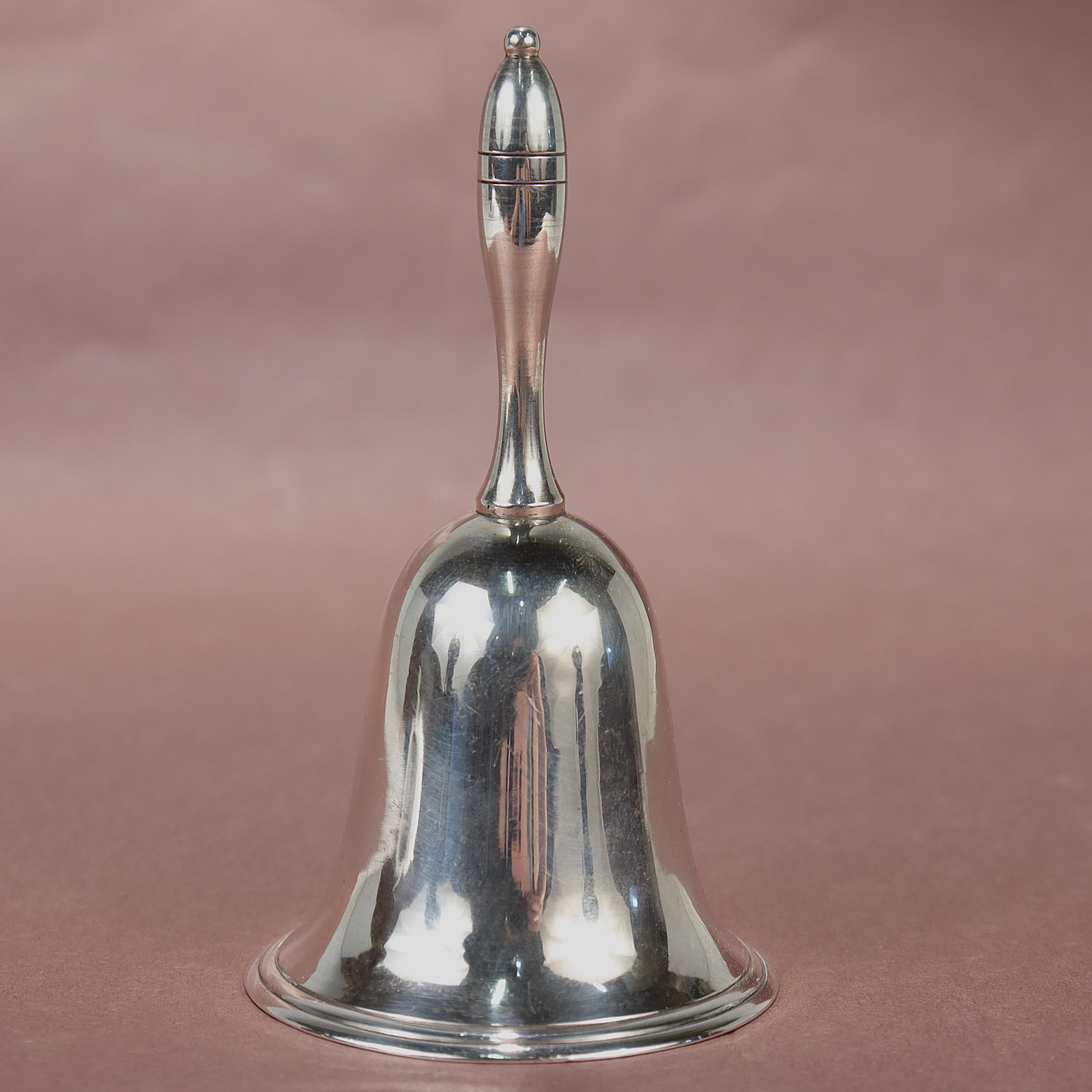 A fine antique Japanese silver bell.

In .950 sterling silver. 

Simply a great Japanese silver bell!

Date:
20th Century

Overall Condition:
It is in overall good, as-pictured, used estate condition.

Condition Details:
There are some light