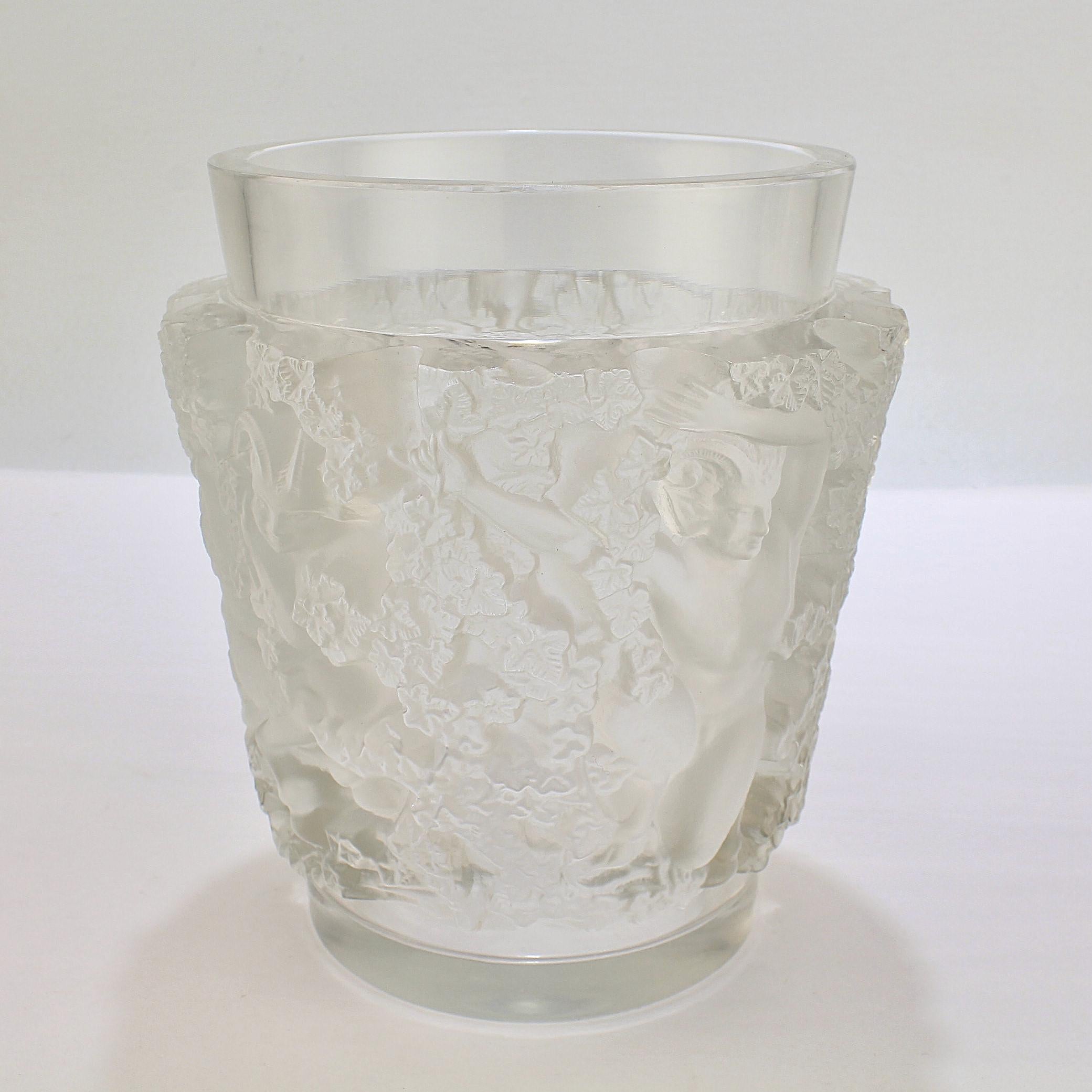 A fine Lalique French art glass vase. 

In the Bacchus pattern depicting satyrs hidden behind ivy.

Simply a wonderful Lalique vase!

Date:
Early to mid-20th century

Overall condition:
It is in overall good, as-pictured, used estate