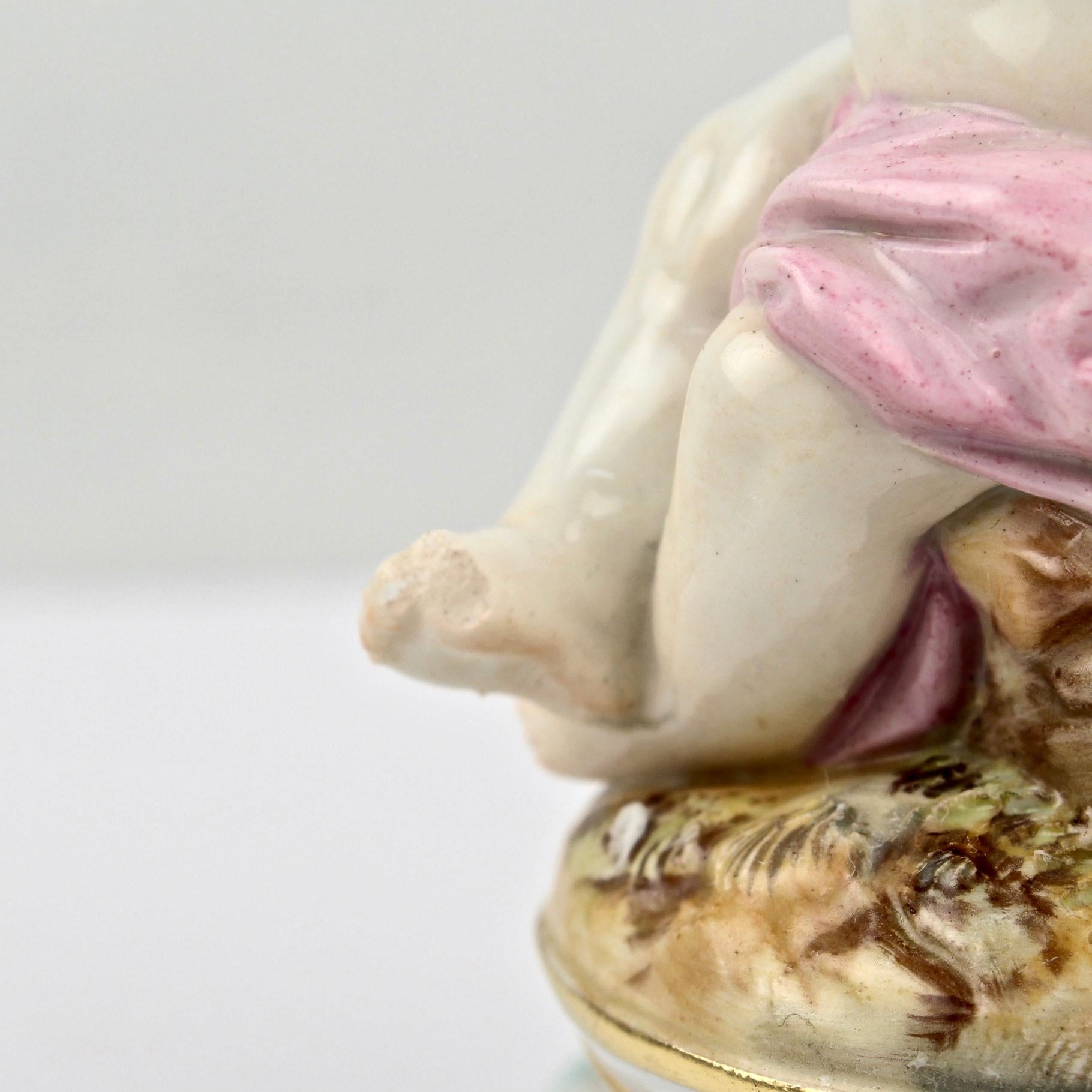 Figurilla de porcelana de Meissen antigua o vieja de Cupido con alas atadas en venta 6