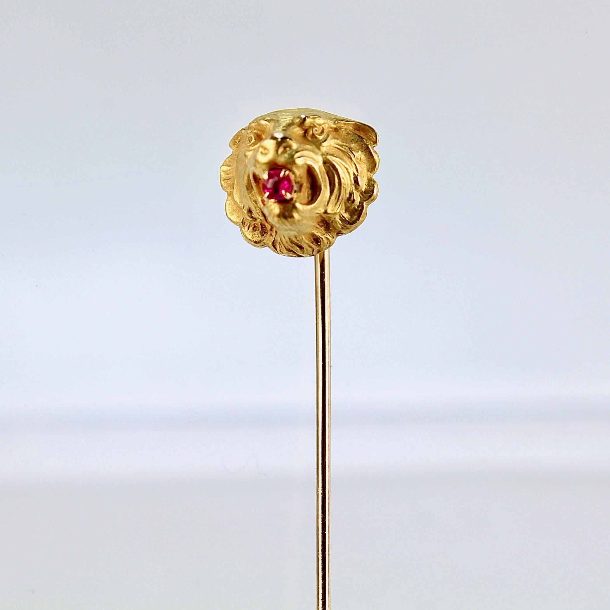 A very fine antique 14k gold stickpin.

In the form of a lion's head with a round ruby prong set in mouth.

Simply a great stickpin!

Date:
Early 20th Century

Overall Condition:
It is in overall good, as-pictured, used estate condition with some