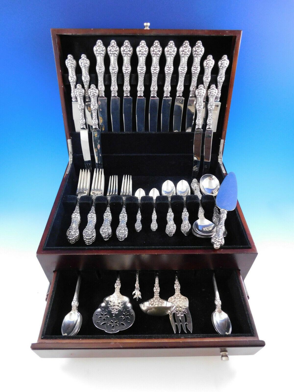 Superb dinner size old orange blossom by Alvin floral sterling silver flatware set - 69 pieces. This set includes:

8 dinner size knives, 9 5/8