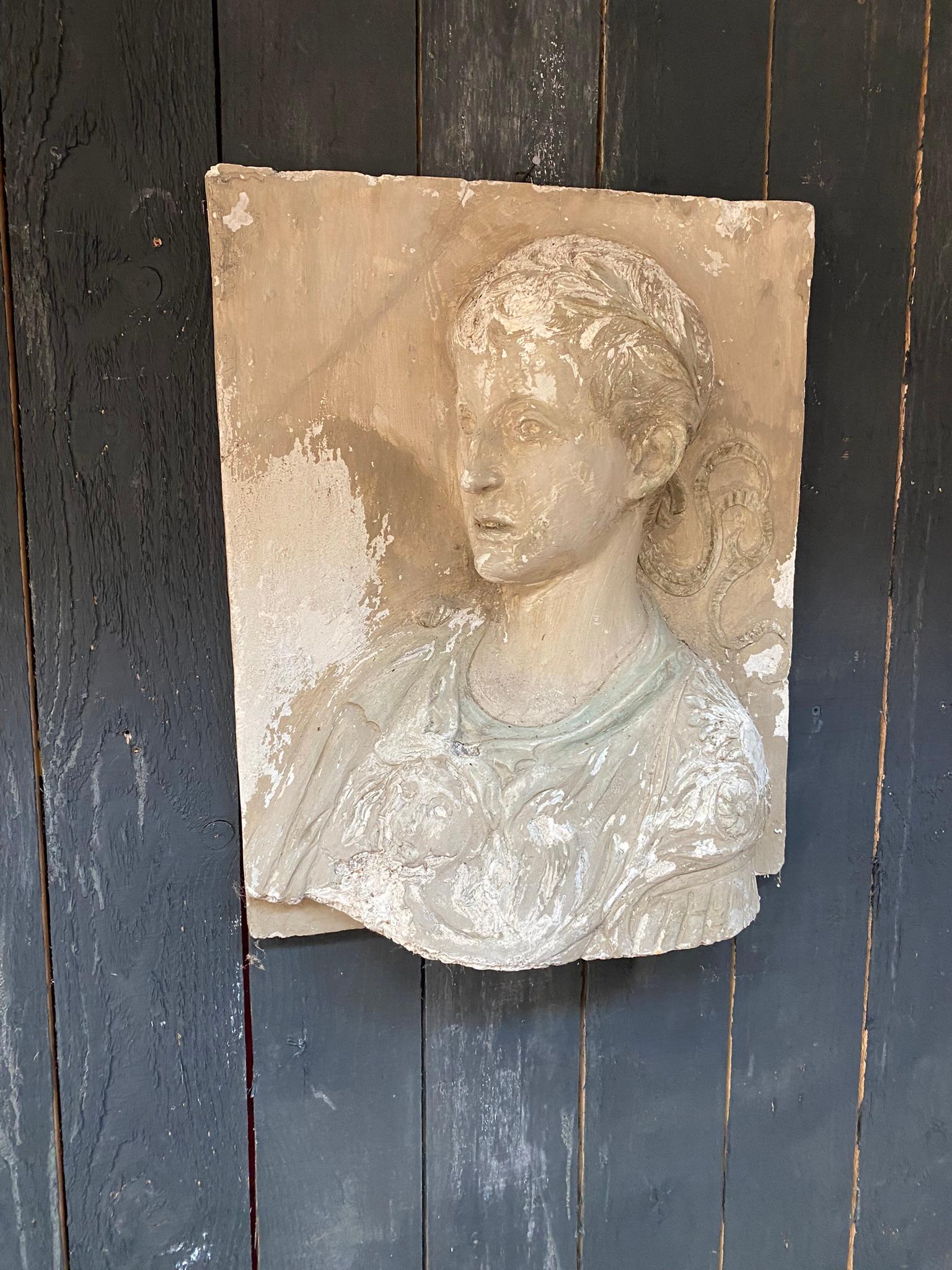 Old panel in high relief, representing a head of a Roman emperor,
has been restored, patina to be redone.