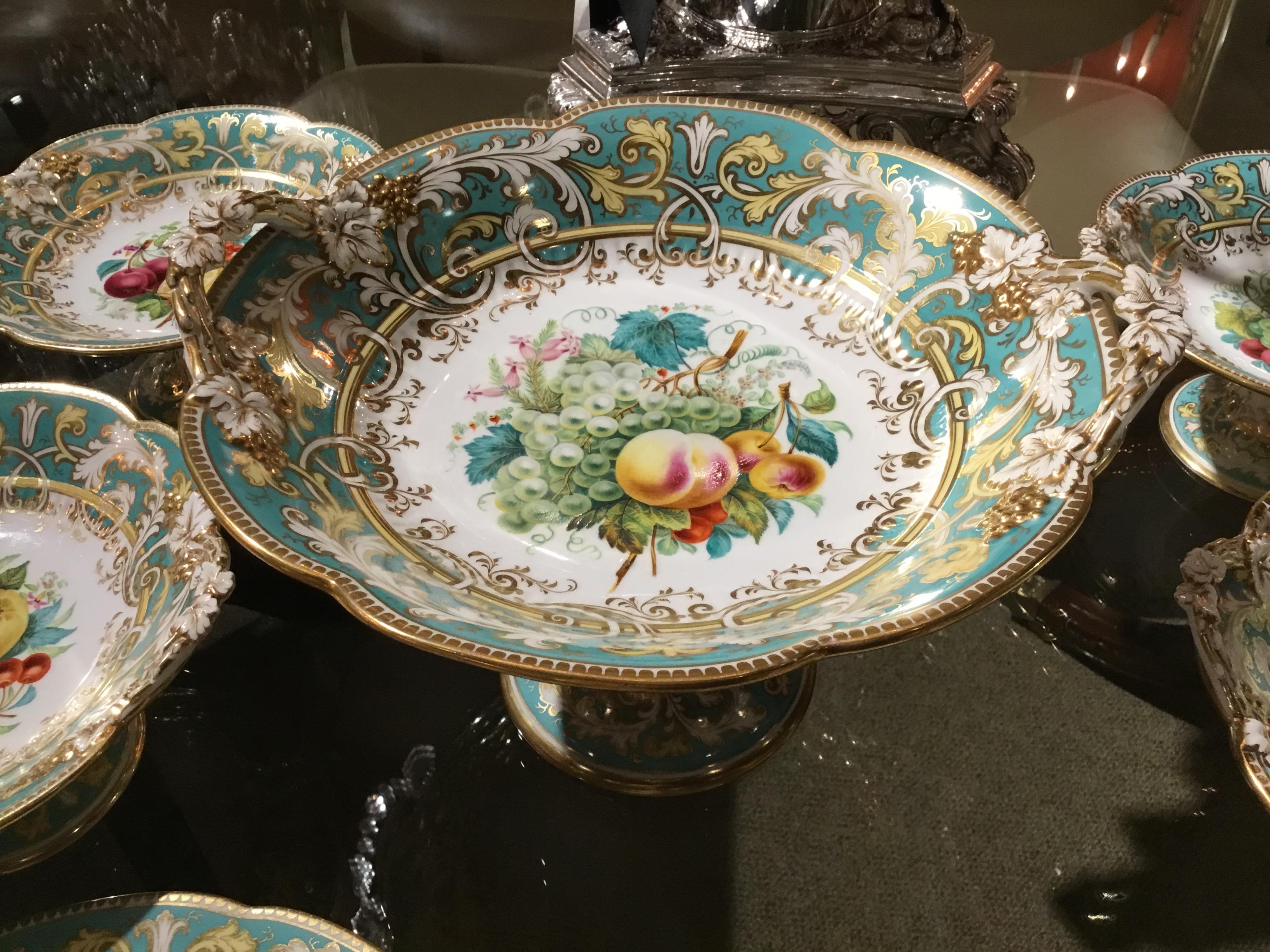 Exquisite set with multiple compotes and centerpiece. In lovely hues of green and a beautiful
Combination of colors at the center, featuring grapes and flowers. The handles in white and gold foliate design.
Comprised of:
One center piece 12”