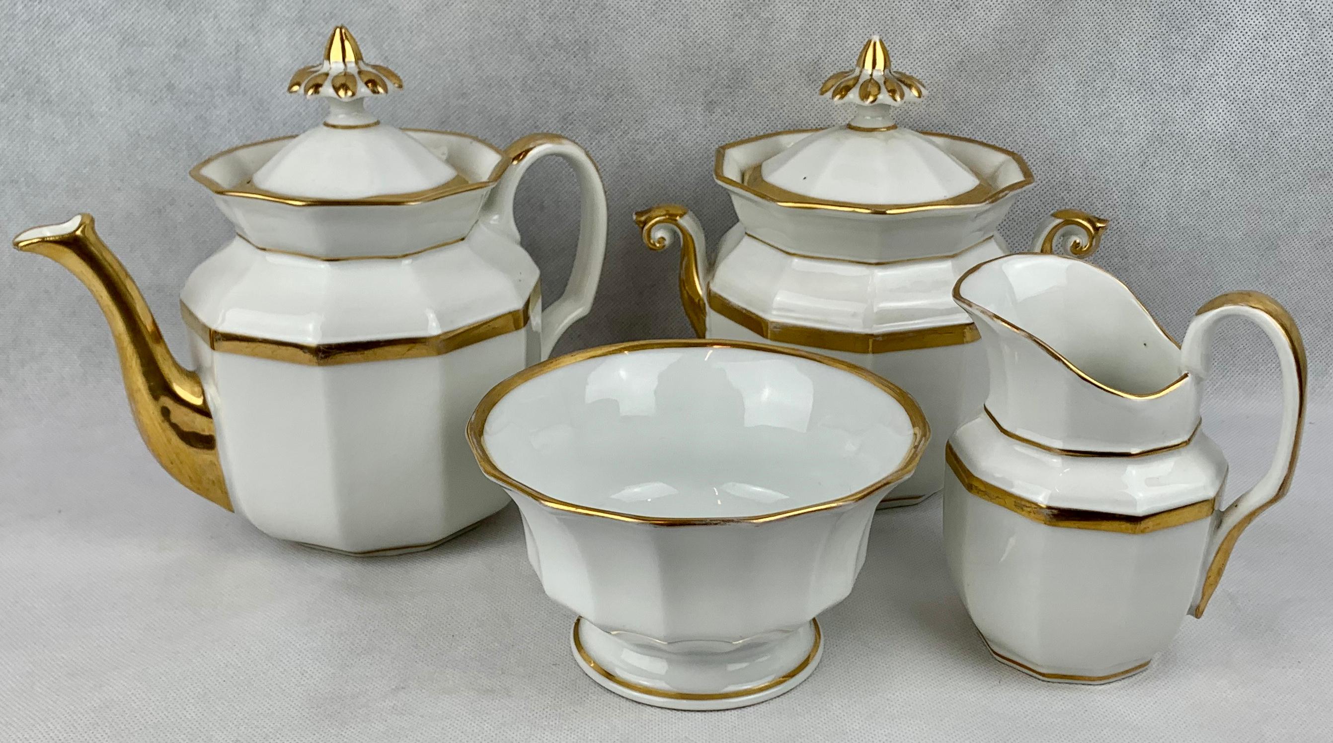 Old Paris Porcelain was created in the Paris area from the end of the 18th century to about 1870. Our 32 piece tea service for eight contains a tea pot with cover, a large sugar bowl with cover, a creamer/milk pitcher, waste bowl, 8 cups and