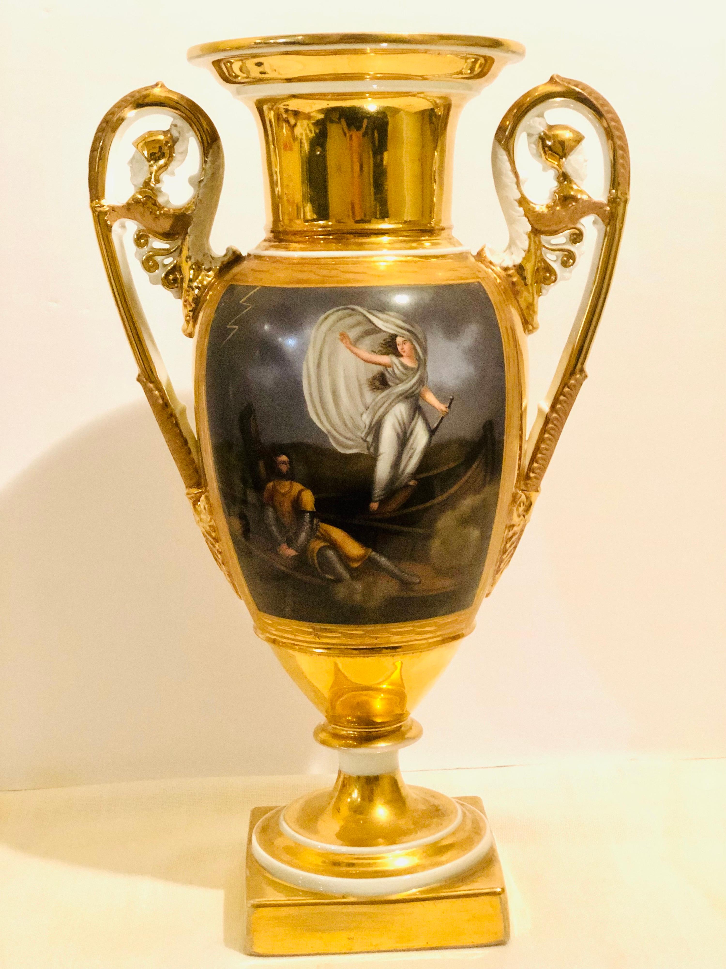 I want to offer you this fabulous Old Paris porcelain vase. This vase is hand painted on both of its sides with different beautiful paintings. One side has a detailed painting of a seascape with people on the shoreline and buildings and boats in the