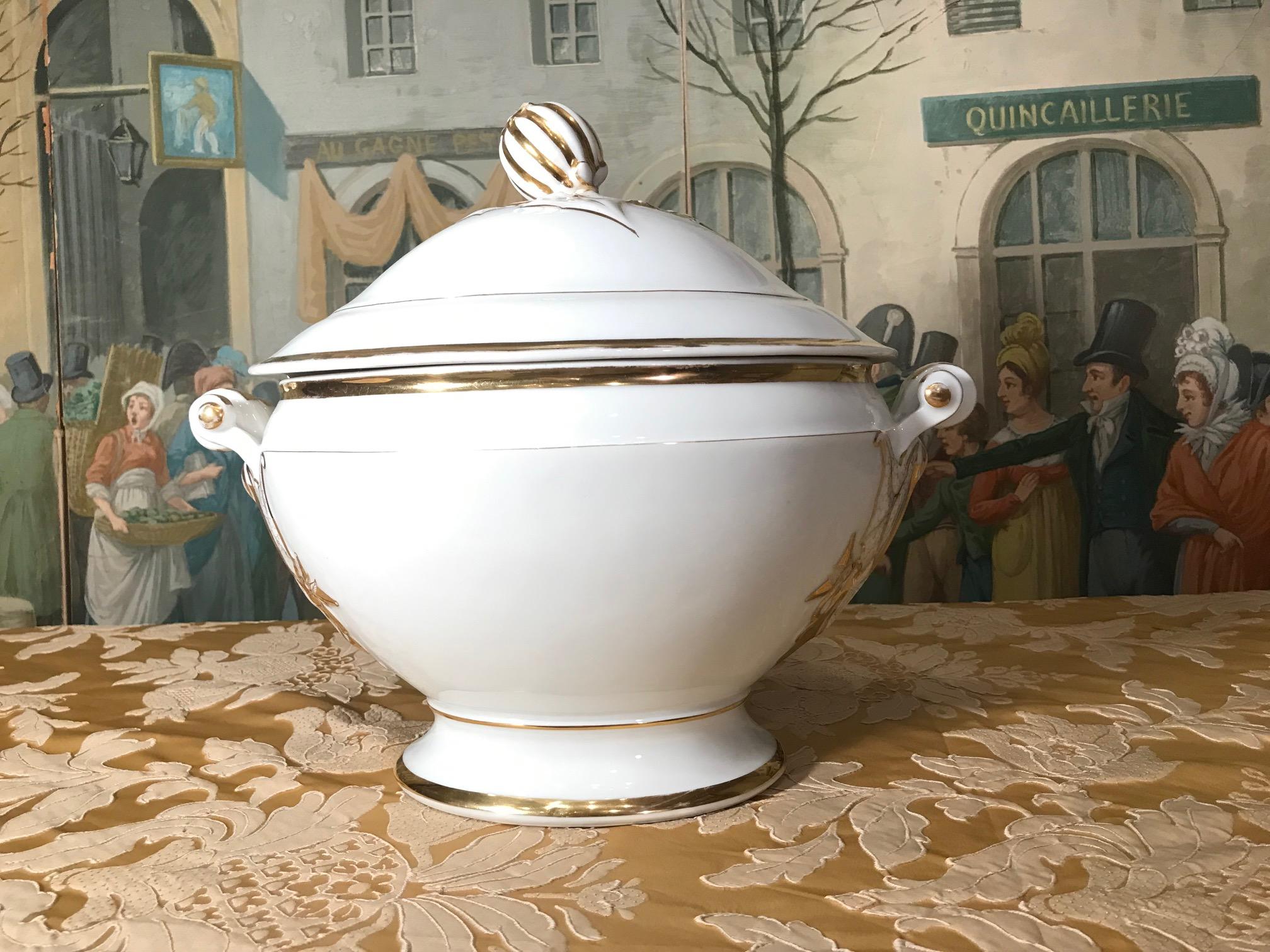 This exceptionally beautiful tureen is not just for soup anymore. It is a stunning piece that will look wonderful anywhere it is placed. Perfect for flowers or fruit. Hard paste porcelain with gilt decoration.