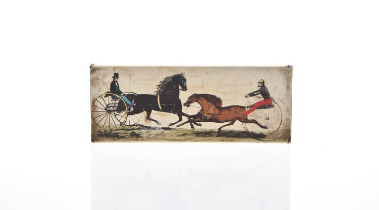 This is a wonderful vintage Fornasetti box. It has an enameled metal cover with Fornasetti's iconic horse carriage and a wooden inner compartment. The bottom is red felt. Manufactured by Fornasetti Milano.

The Italian painter, sculptor, craftsman