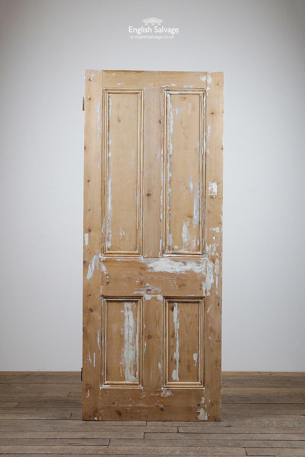 Reclaimed four panel door with beading to both sides. Has been previously stripped and there are a few filled areas and residue as shown in the photos. Old fitting hole, two hinges remain.