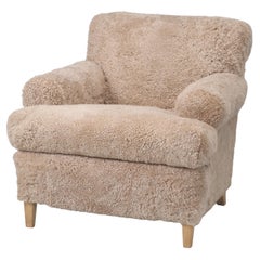 Fauteuil Old Plank's recouvert du plus beau shearling importé de Nouvelle-Zélande.