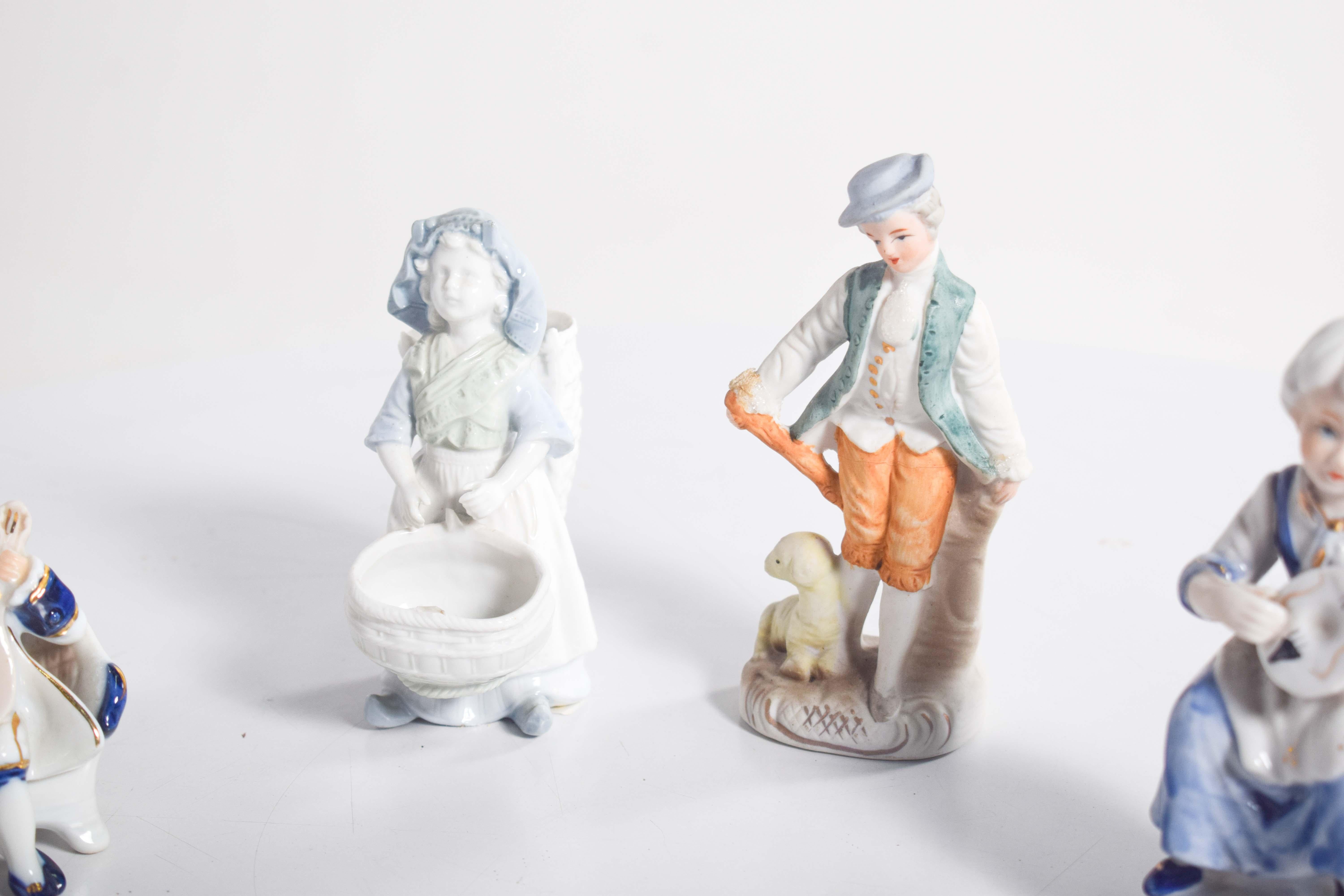 Mid-Century Modern Old Porcelain Decorative Figures, Set of Four For Sale