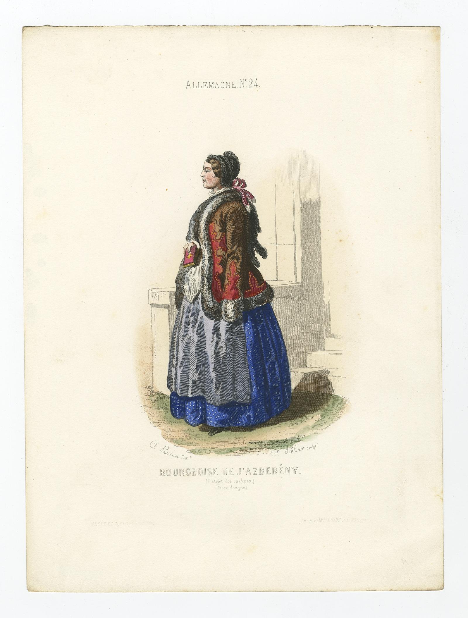 Antique costume print titled 'Bourgeois de J'Azberény'. 

Old print depicting a Bourgeoise in folk costume from Jászsági, lower Hungary. This print originates from 'Costumes Moderne (Musée de Costumes). 

Artists and Engravers: Published in