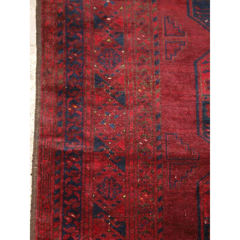 20th Century Old Red Afghan Carpet with Traditional Design For Sale