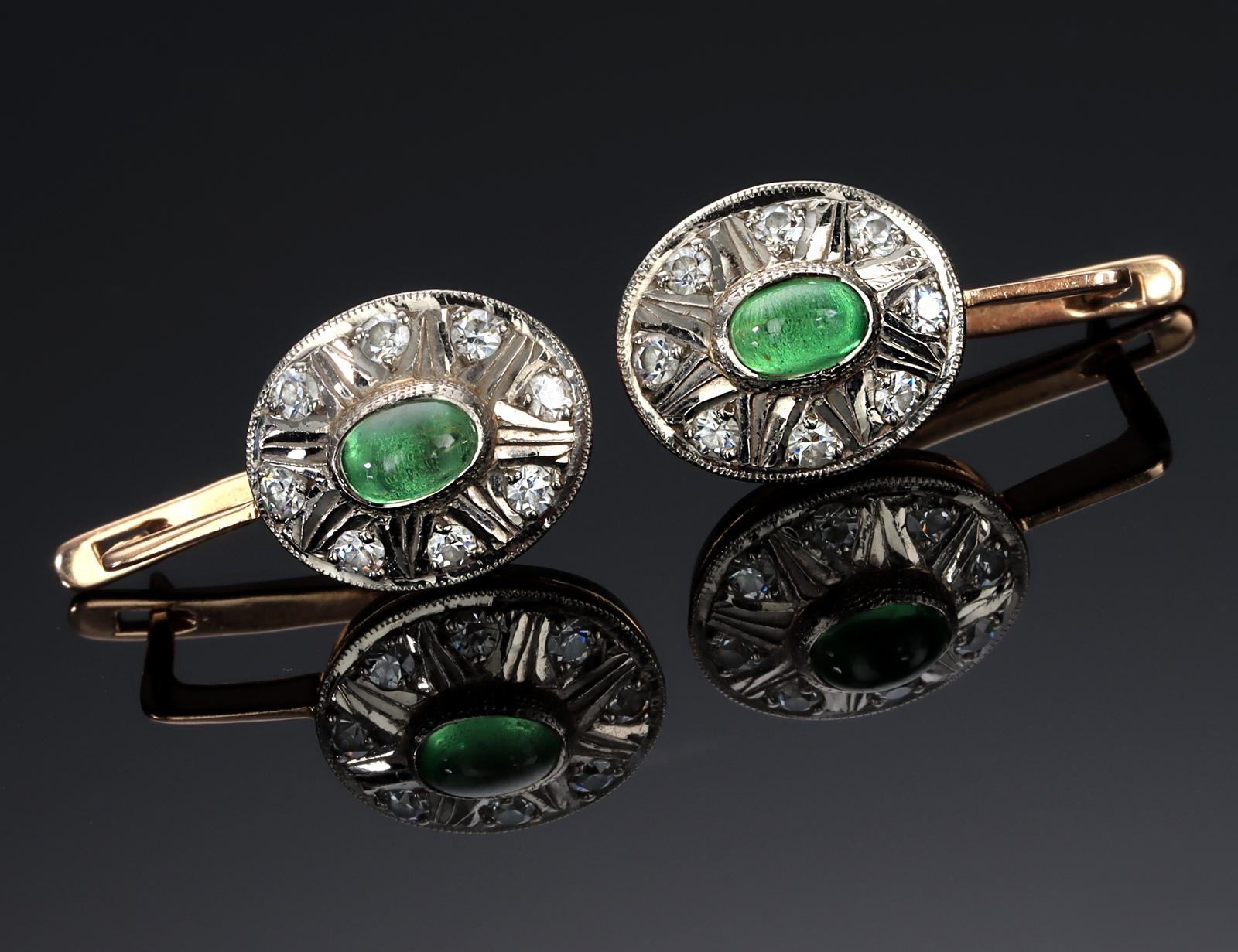 Vintage 14-carat gold earrings with silver elements, green cabochon-cut tsavorite and rosette-shaped goschenets.

Origin: Russia, mid-20th century (preserved hallmark for 0.585 gold after 1917, hammer and sickle in a star)

Two cabochon-cut