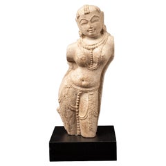 Old sandstone Apsara statue from India
