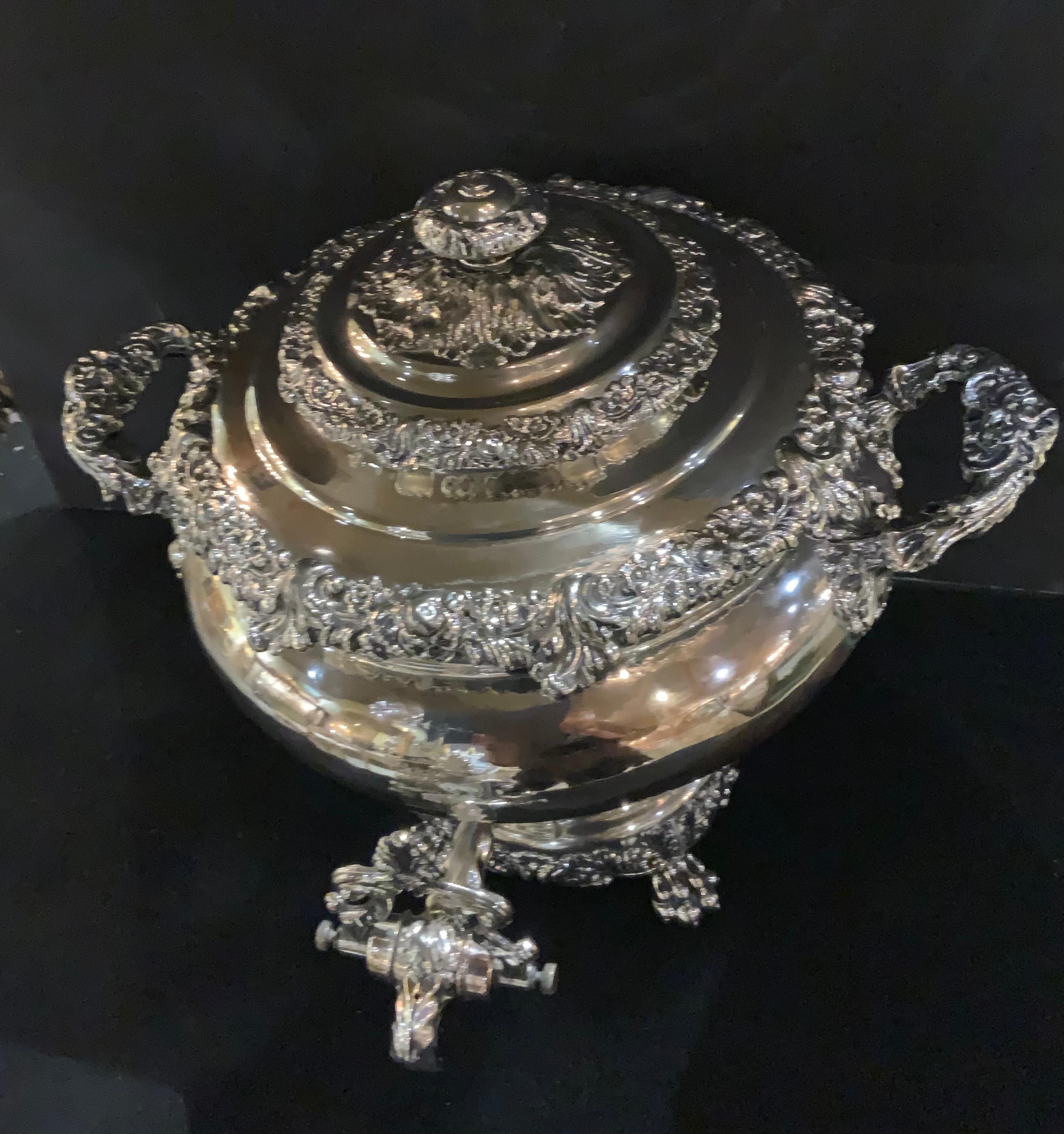 The excellent workmanship exhibited in this piece makes
It exceptional. A coat of arms is engraved on the front 
Which bears the arms of Pearce Impaling Haines. The silver
Work is impeccable and has not dents or scratches. It is
In fine working