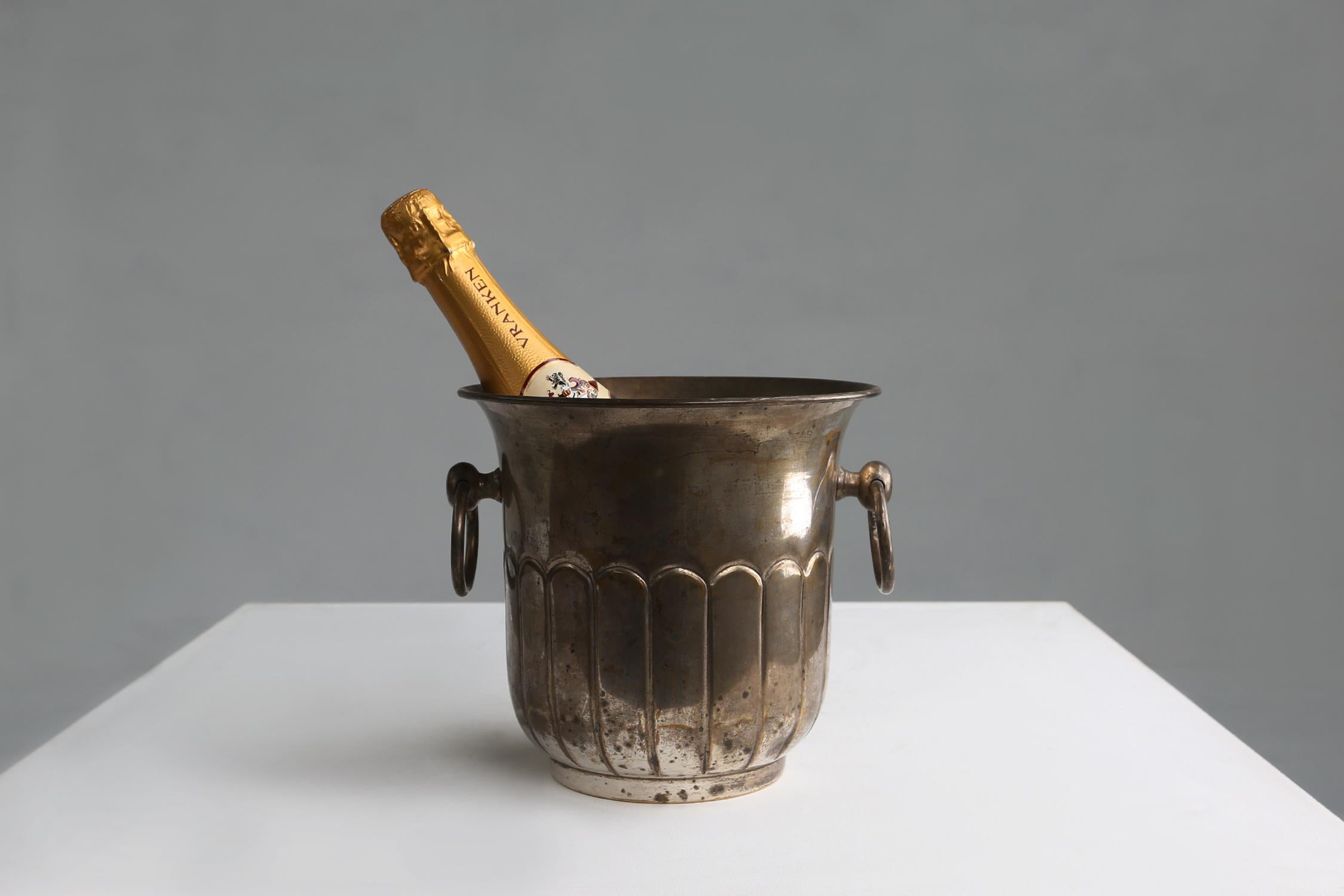 Made in France, circa 1900.
This is a silver brass ice bucket or wine cooler.
Is in a good used condition with some great patina.