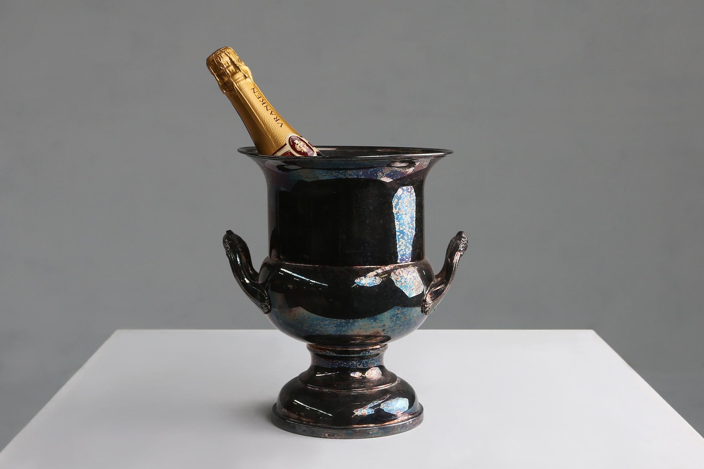 Made in France, circa 1900.
This is a silver brass ice bucket or wine cooler.
Is in a good used condition with some great patina.