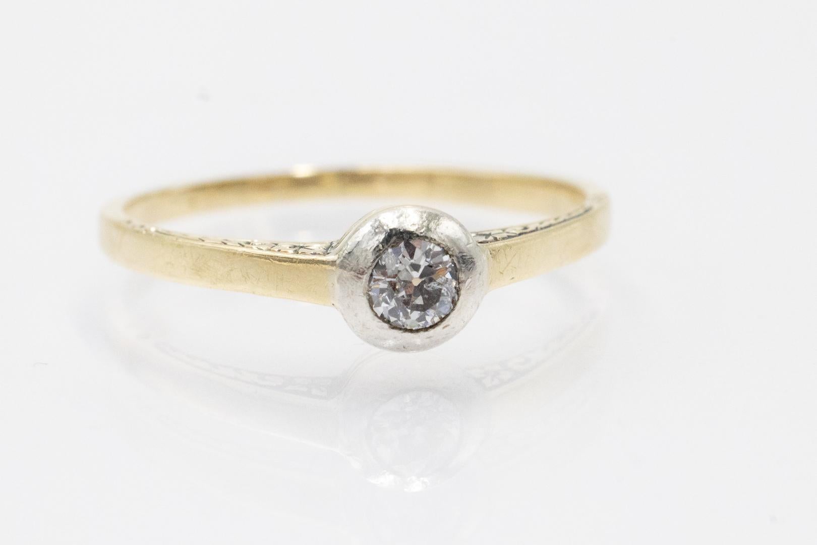 Old solitaire ring with a diamond in an old brilliant cut weighing 0.20 ct. Czechoslovakia 1930s/1940s.

Old ring made of 14-karat yellow gold (0.585 fineness) with a single diamond in an old brilliant cut weighing approx. 0.20 ct (P1 purity, I