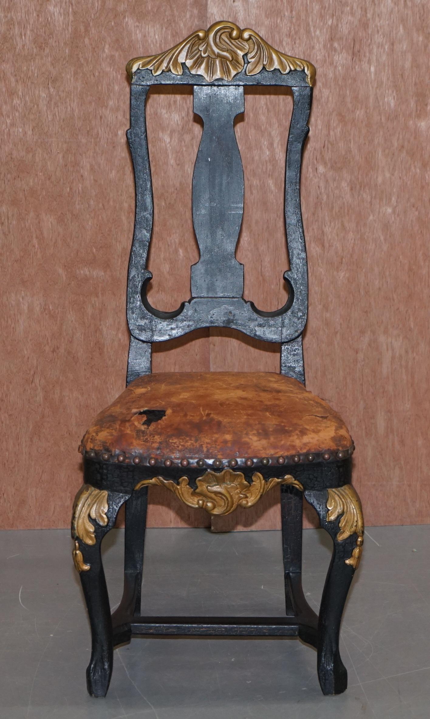 We are delighted to offer for sale this very old and original Spanish high back carved occasional chair

An ornately carved and decorated original chair. The leather upholstery is period, heavily distressed with horse hair padding. The frame is