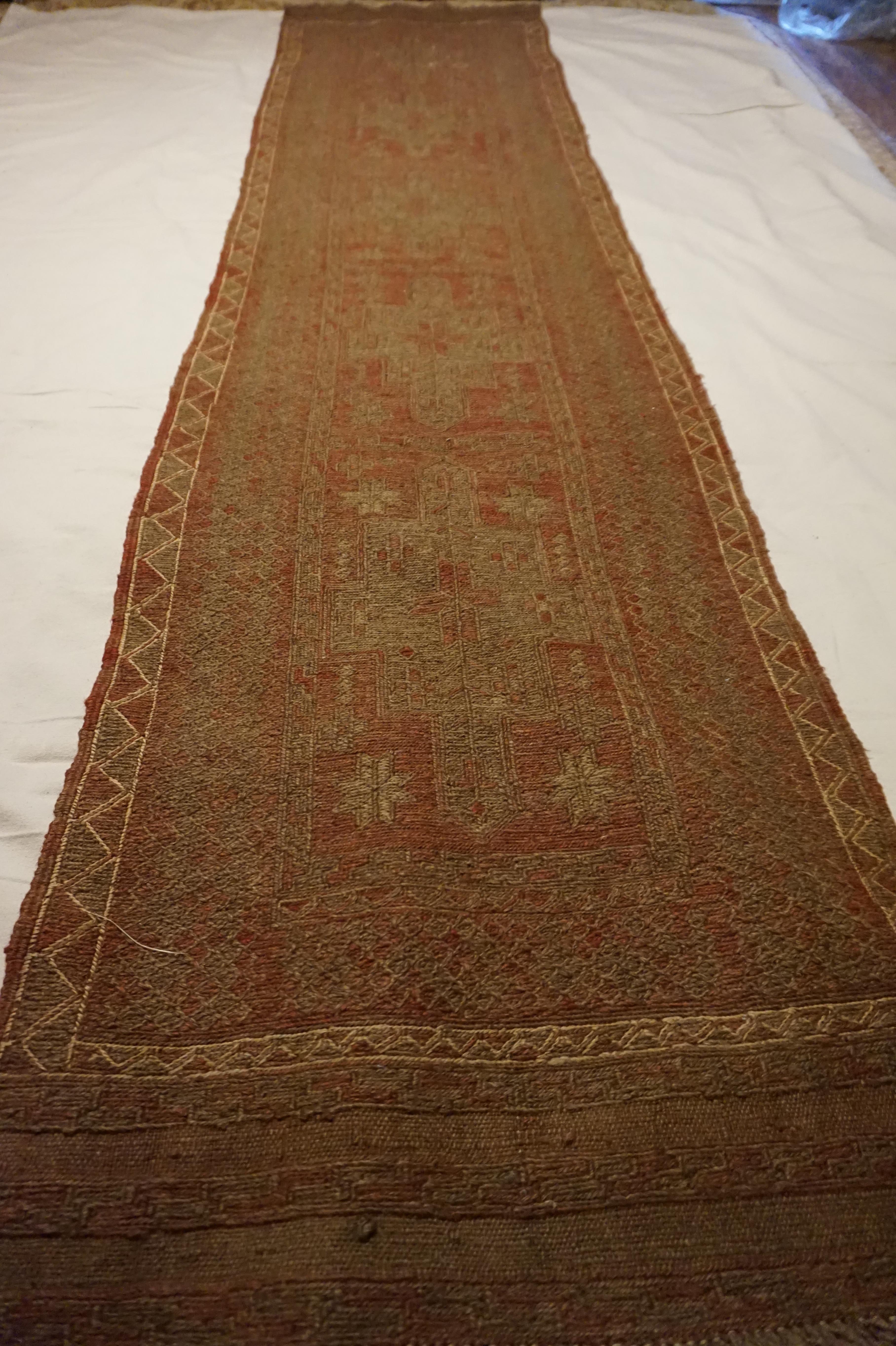 Semi-antique Baluch wool on wool kilim. Very subtle, muted flat-weave which exudes a quiet warmth and refinement. Beautifully hand knotted in pure wool and finished on both sides. These colours are not seen anymore. In very good condition. Ideal for