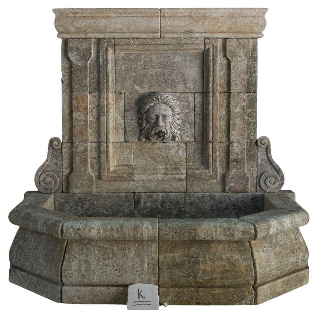 This old French Limestone fountain was hand carved in the mid 17th century and installed in a French countryside home. The piece has been well preserved throughout the years and was recently reclaimed by our team. The natural stone aging process