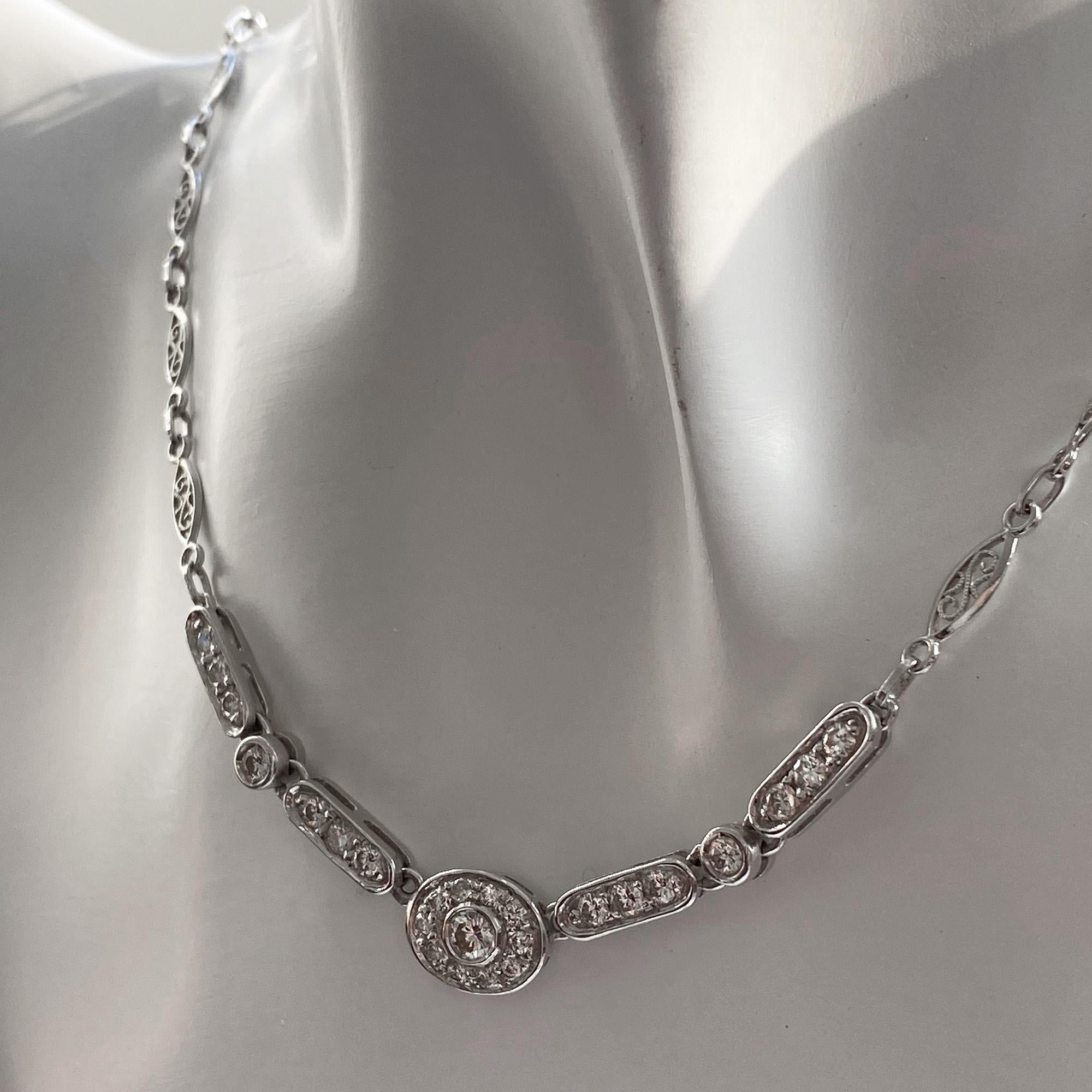 Vintage Necklace 
Total Weight : 10,75gr (18 kt white gold)
Natural Diamonds : 25pcs - estimated 1,41ct total
Size : 45cm