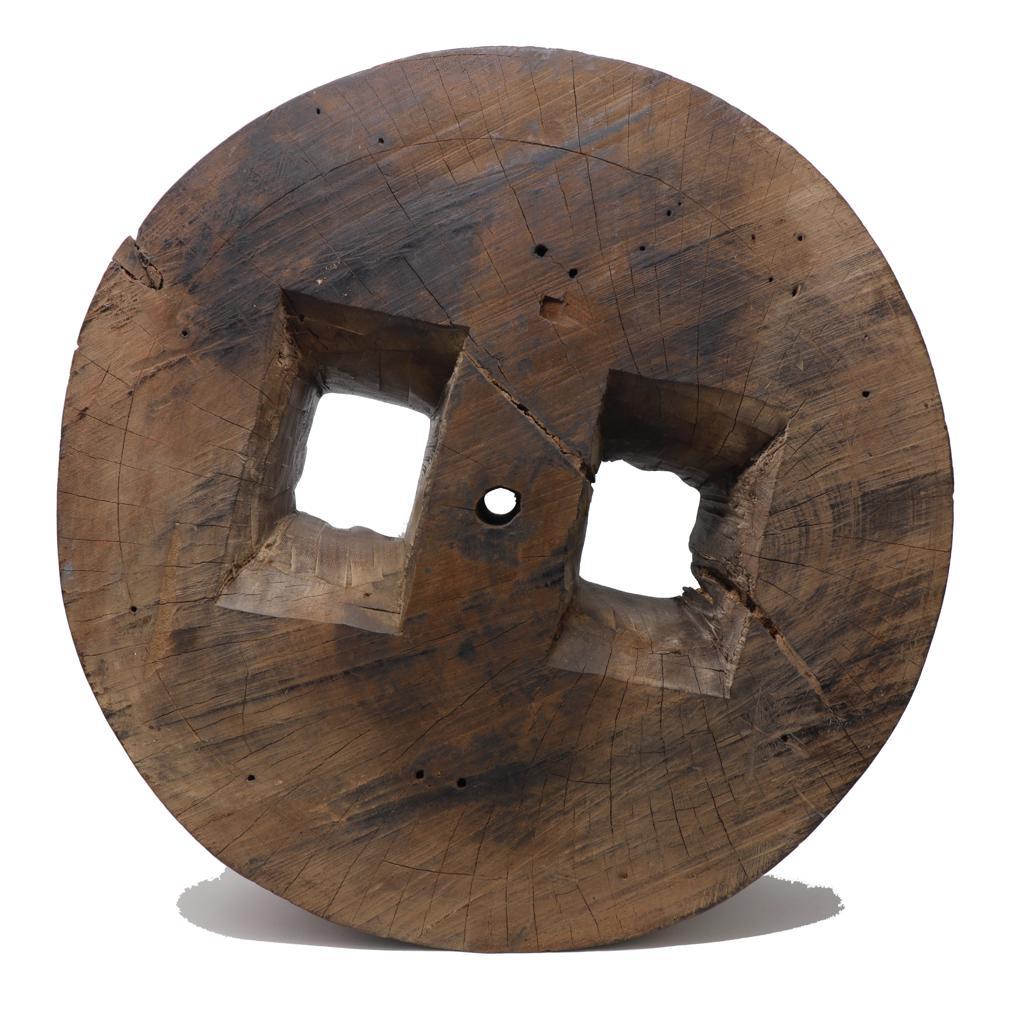 Hand-Carved Old Thai Ironwood Millstone For Sale
