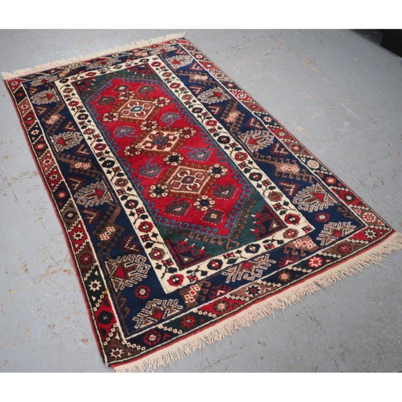 A Turkish Dosemealti rug of the traditional design for this village
Circa 1960
A very good and well made rug with excellent colour including a clear red ground with three small medallions and floral rosettes The border designs are very well drawn