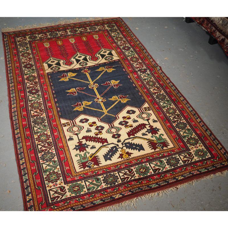 Old Turkish prayer rug of traditional Ladik design in outstanding condition.

A good decorative example of this traditional Turkish Ladik design, the rug is woven with soft wool and has pleasing colours.

The rug is in excellent condition with