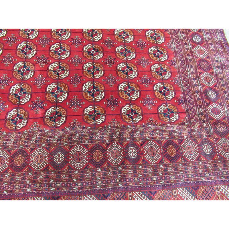 Old Turkmen carpet of traditional Tekke design, the carpet is of a useful squarish size and has good wool and a rich colour. These carpets are known as Russian Turkmens as they were originally made for export to wealthy Russians.

The carpet has