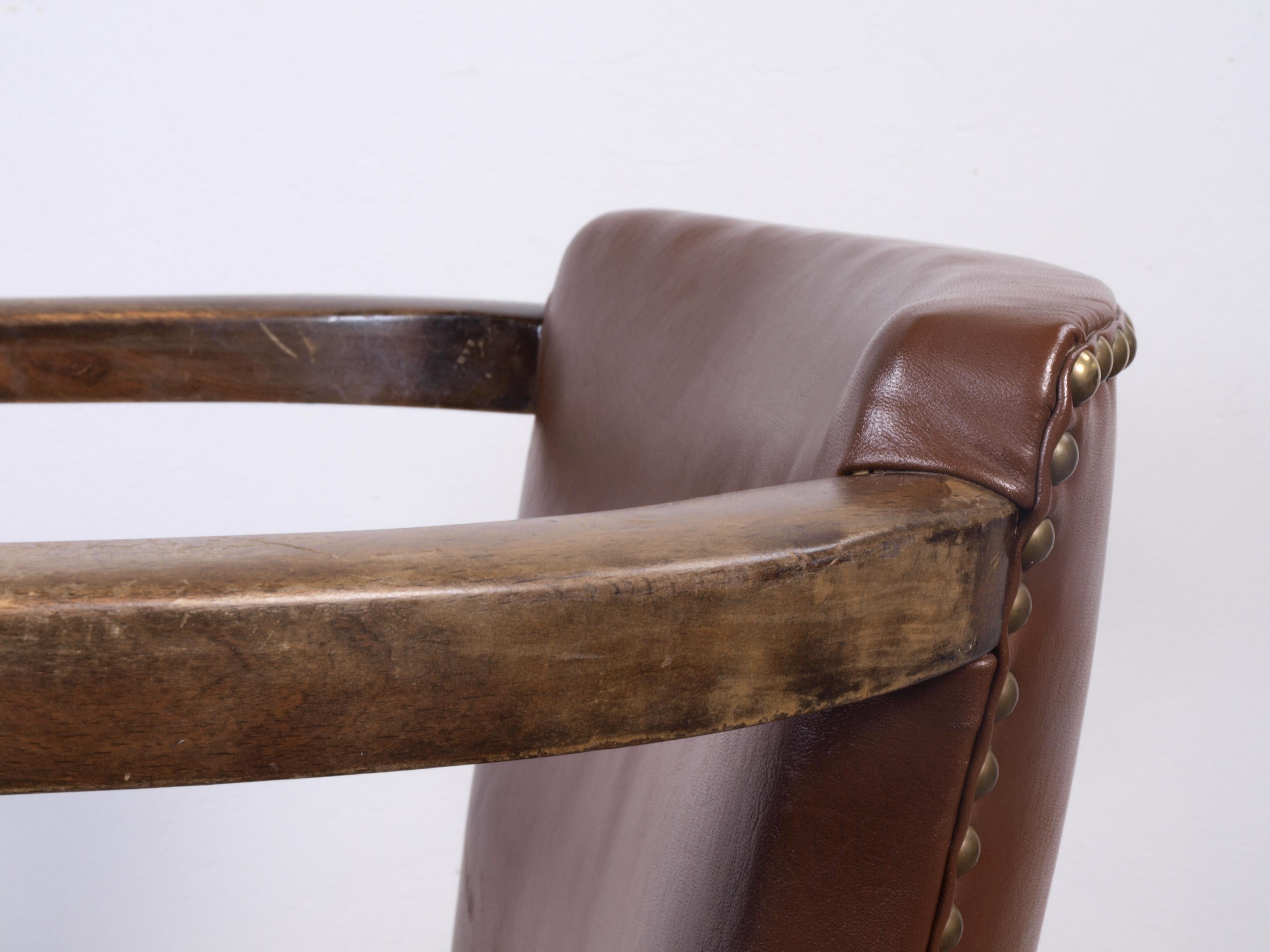 Leather Old Unknown designer arm chair For Sale