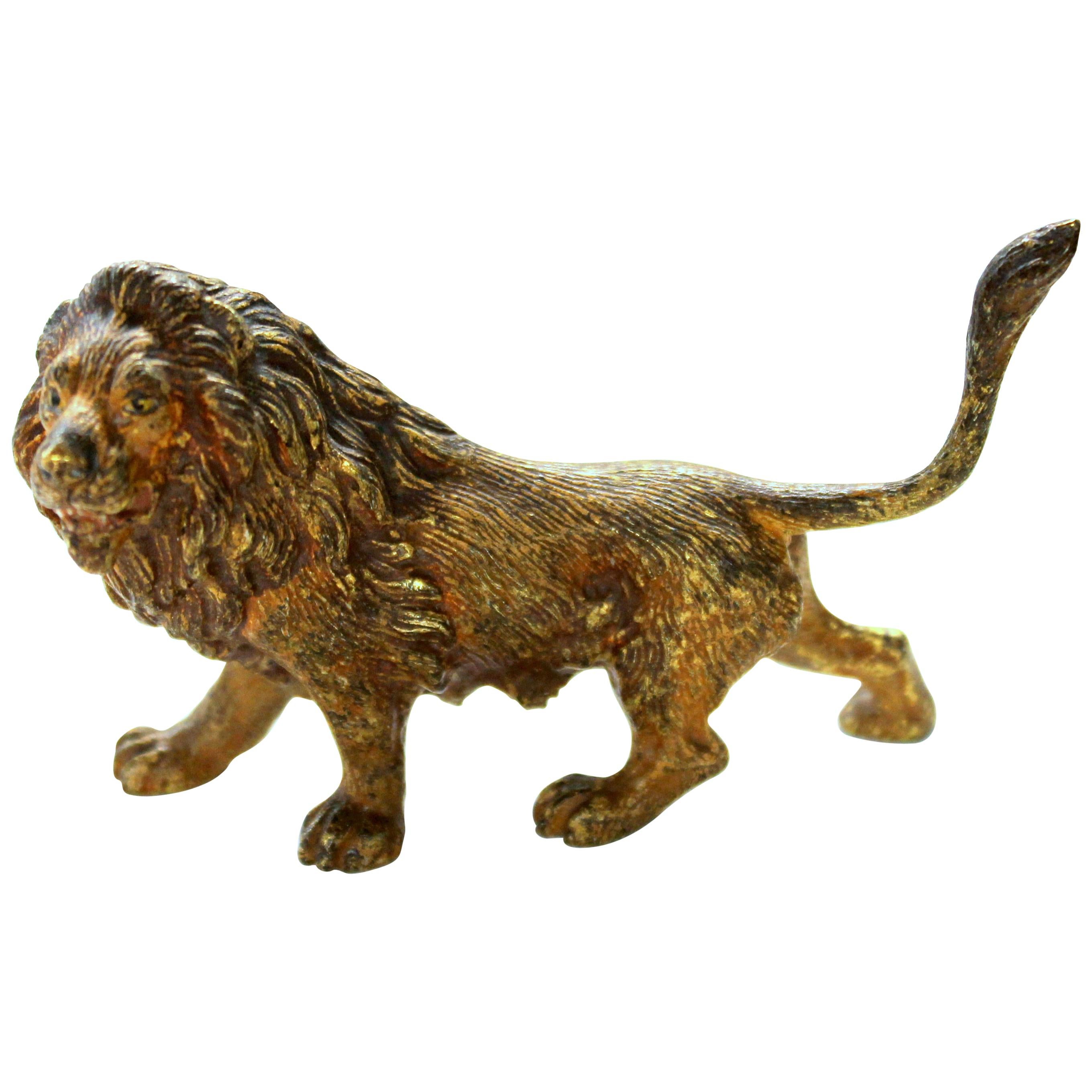 Ancienne figurine en bronze peint à froid de Vienne représentant un petit lion, signée Franz Bergmann