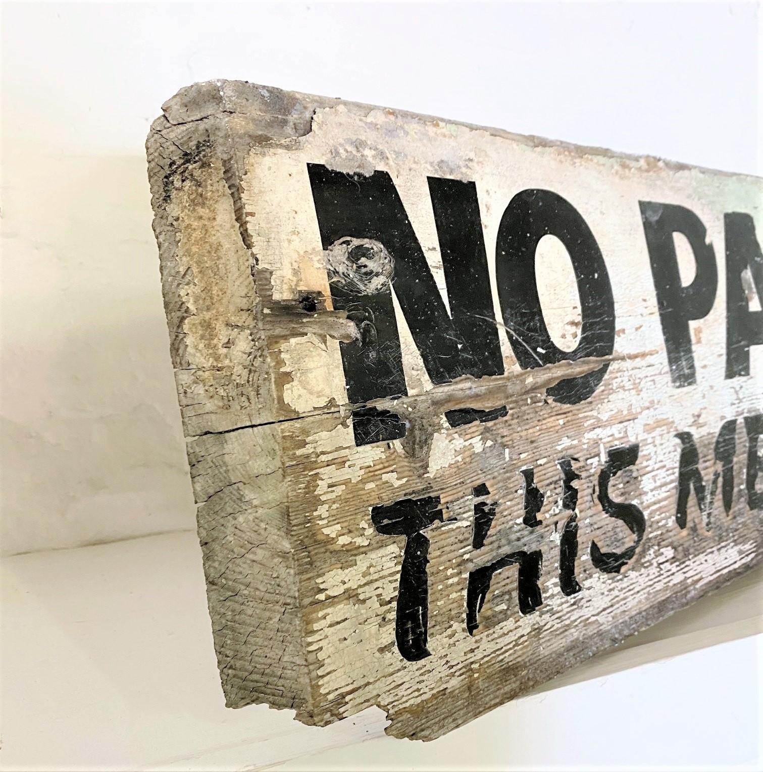 A fun hand painted wooden sign reads ‘NO PARKING THIS MEANS YOU’ – Definitely some British humour!
A very old sign, probably dates back to Mid 20th Century. the condition is as seen, the wood is old but has been treated and sealed to preserve the