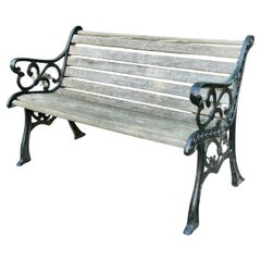 Old Weathered Oak and Iron Scroll End Garden Bench  A very good quality piece