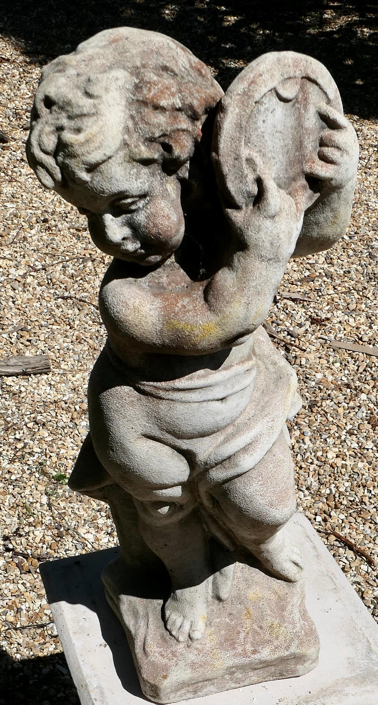 Folk Art Old Weathered Statue of a Putti Playing Tambourine    For Sale