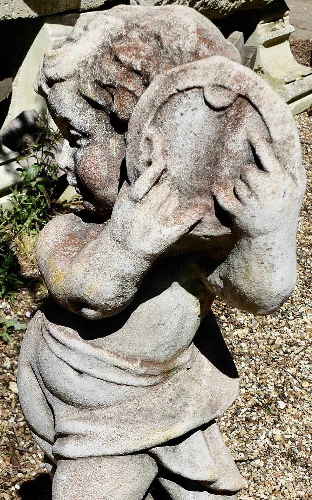 Early 20th Century Old Weathered Statue of a Putti Playing Tambourine    For Sale