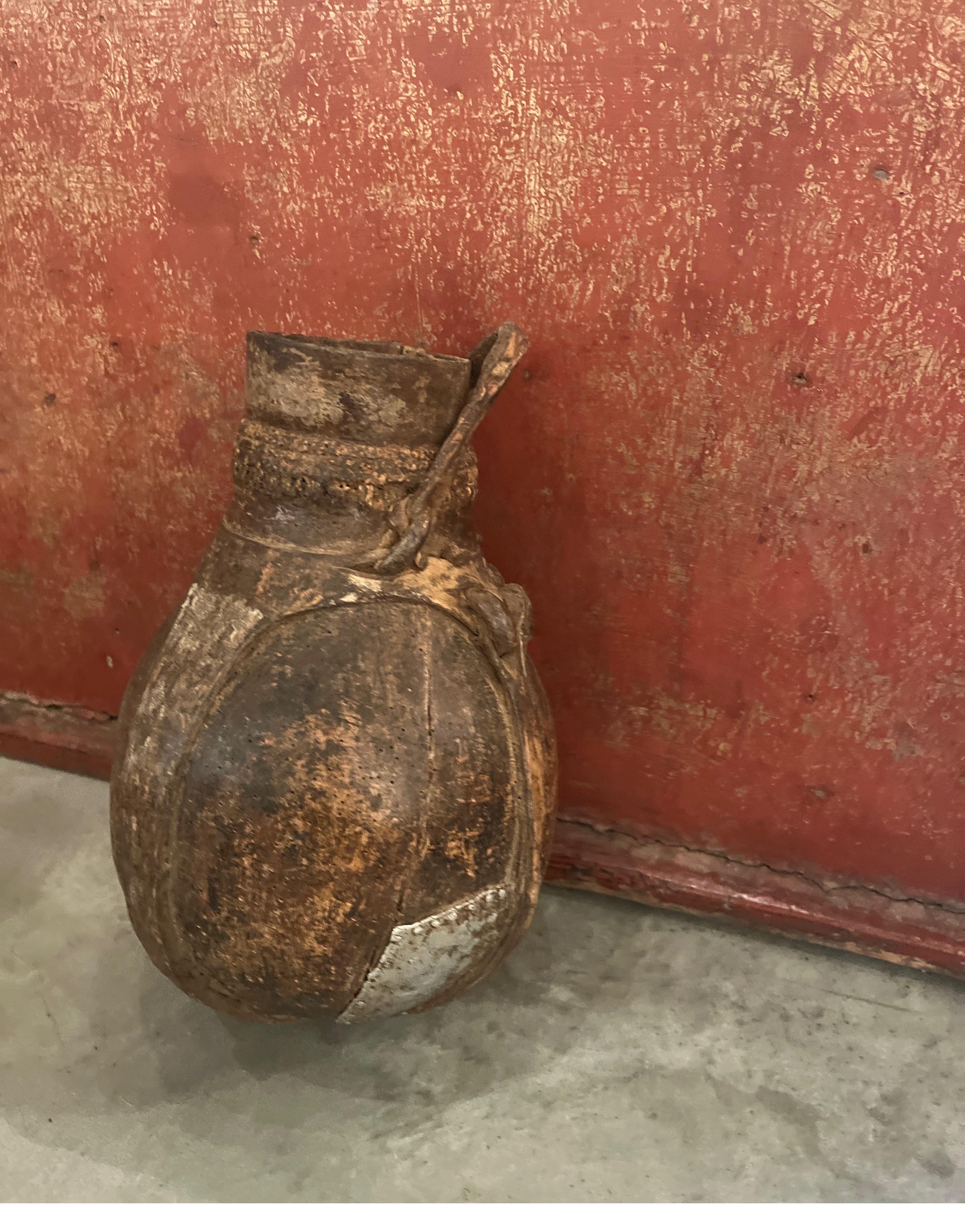 Old Weathered  Wood And Leather Container With Metal Repair From Africa For Sale 3